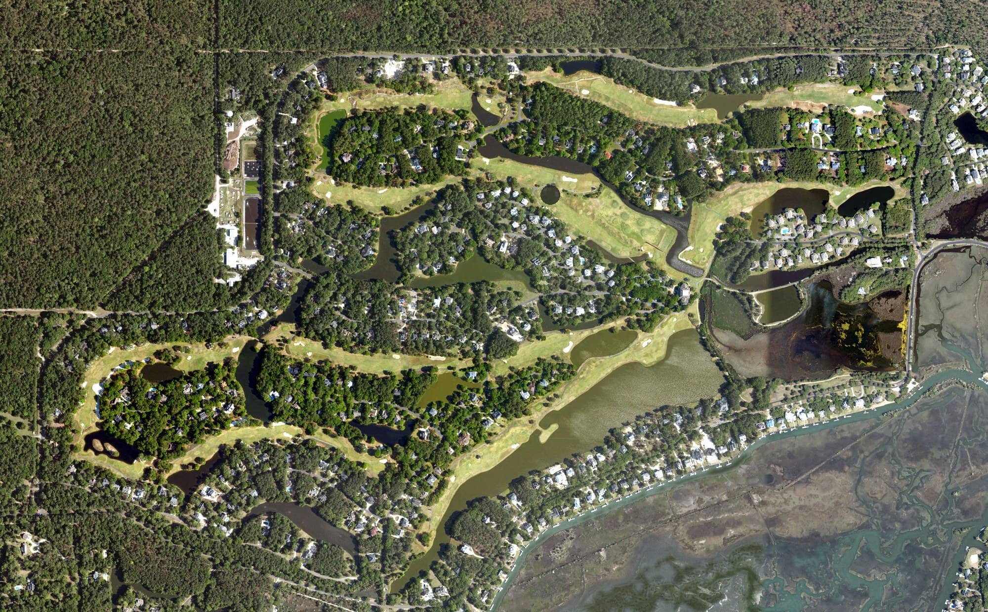 Aerial view of Debordieu Club, SC, with its hole routing marked