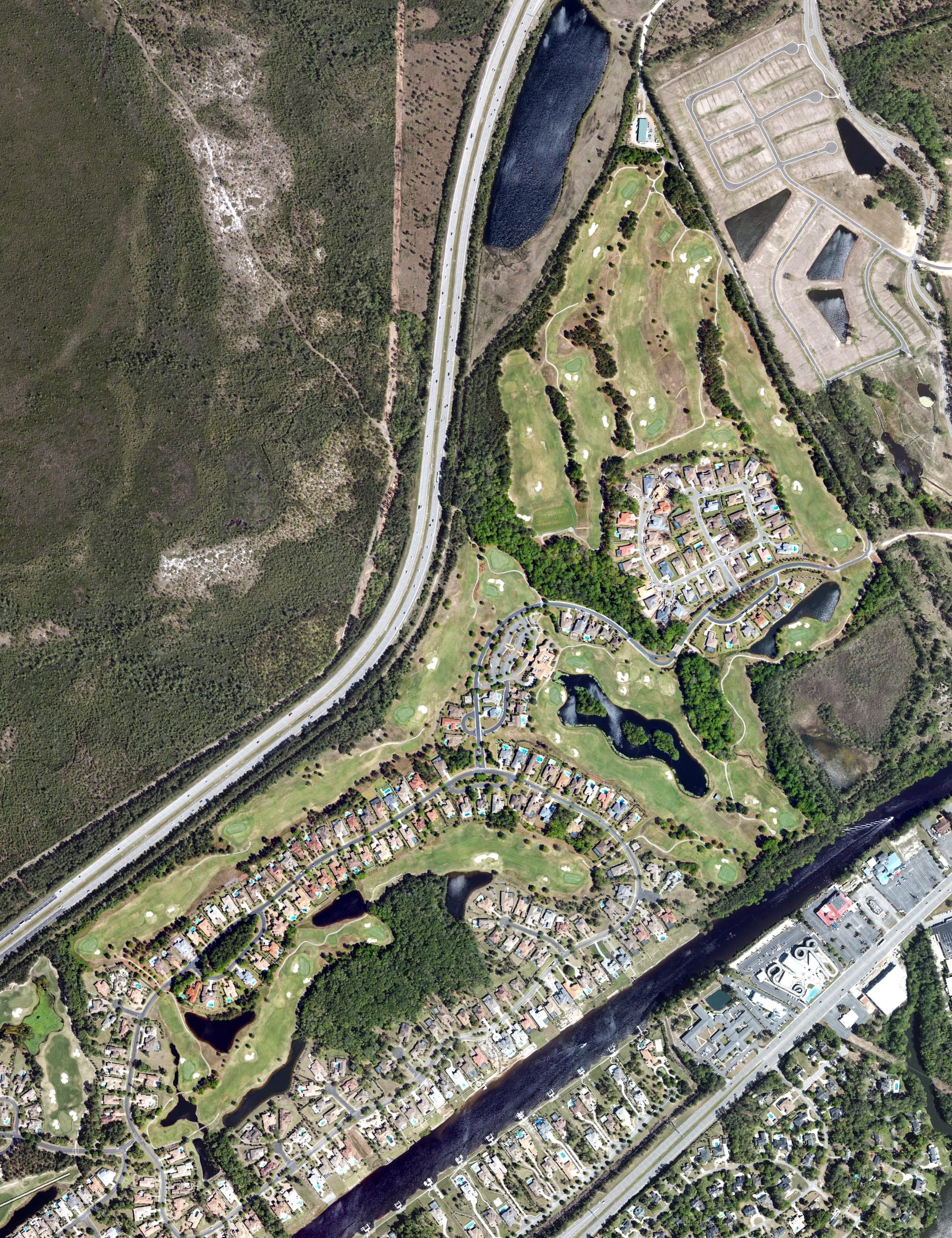 Aerial view of Grande Dunes Members Course, SC, with its hole routing marked