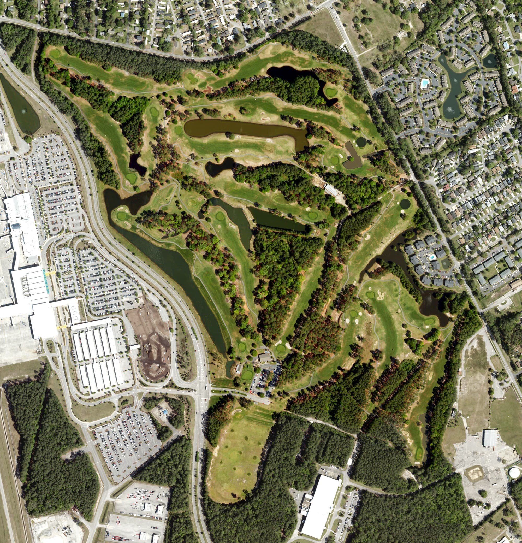 Aerial view of Whispering Pines Golf Course, SC, with its hole routing marked