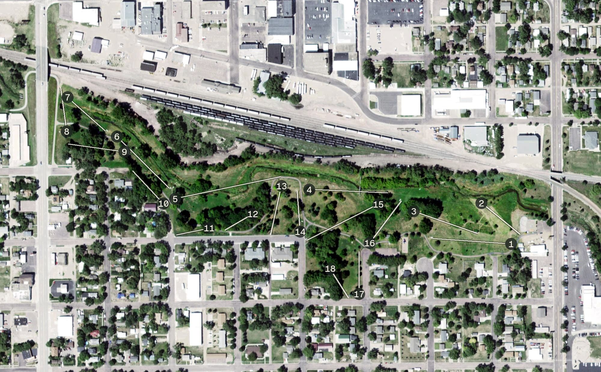 Aerial view of Dry Run Creek Park & Disc Golf Course, SD, with its hole routing marked