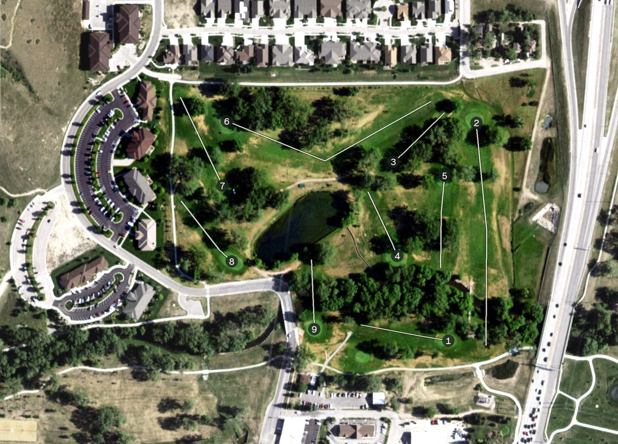 Aerial view of Executive Golf Course, SD, with its hole routing marked