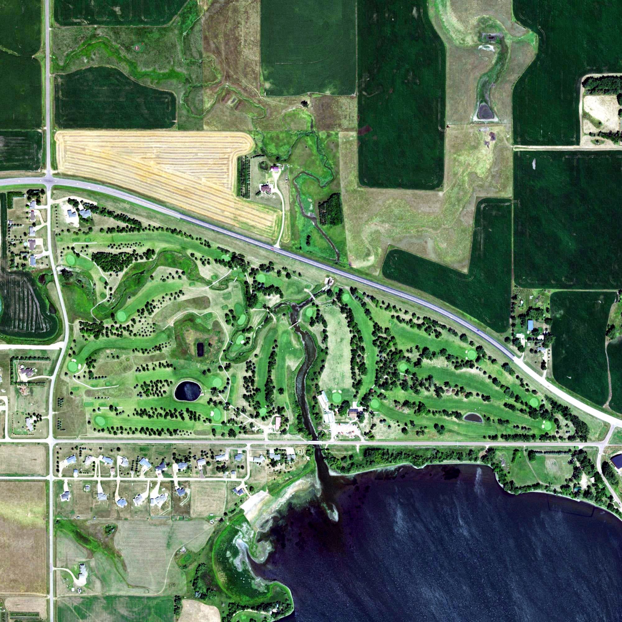 Aerial view of Madison Golf & Country Club, SD, with its hole routing marked
