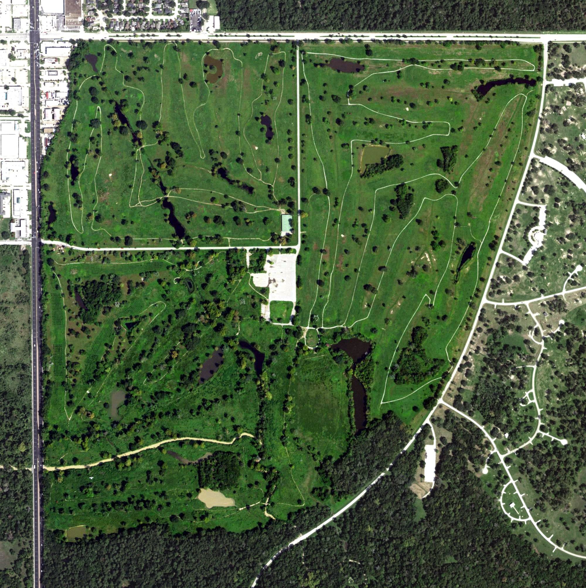 Aerial view of Bear Creek Golf World, TX, with its hole routing marked