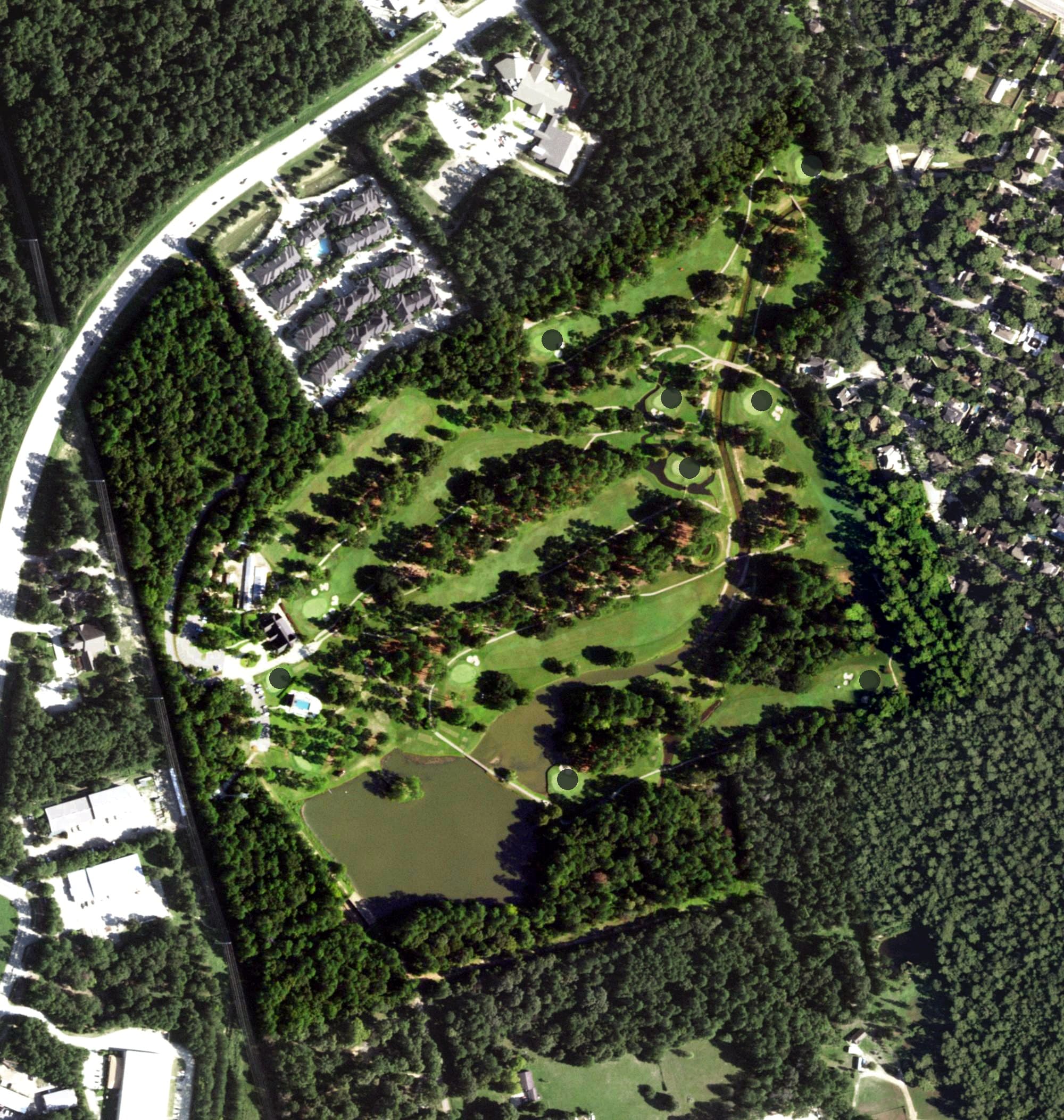 Aerial view of Conroe Country Club, TX, with its hole routing marked