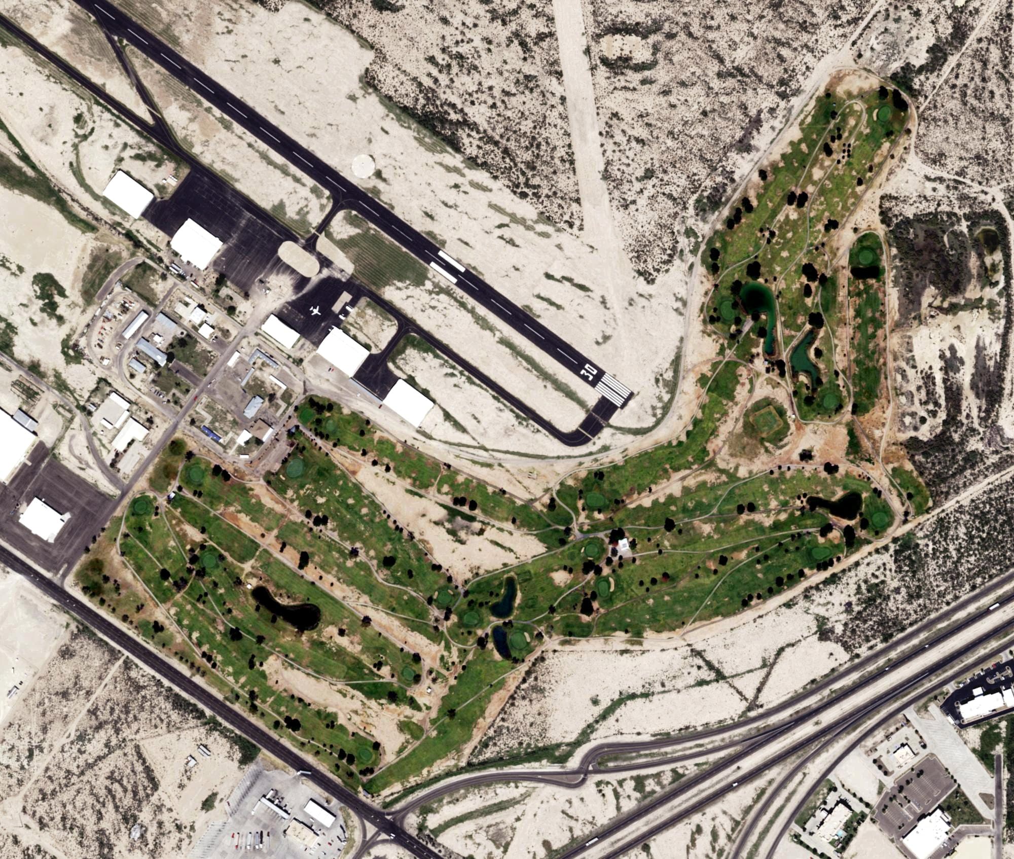 Aerial view of Desert Pines Golf Course, TX, with its hole routing marked