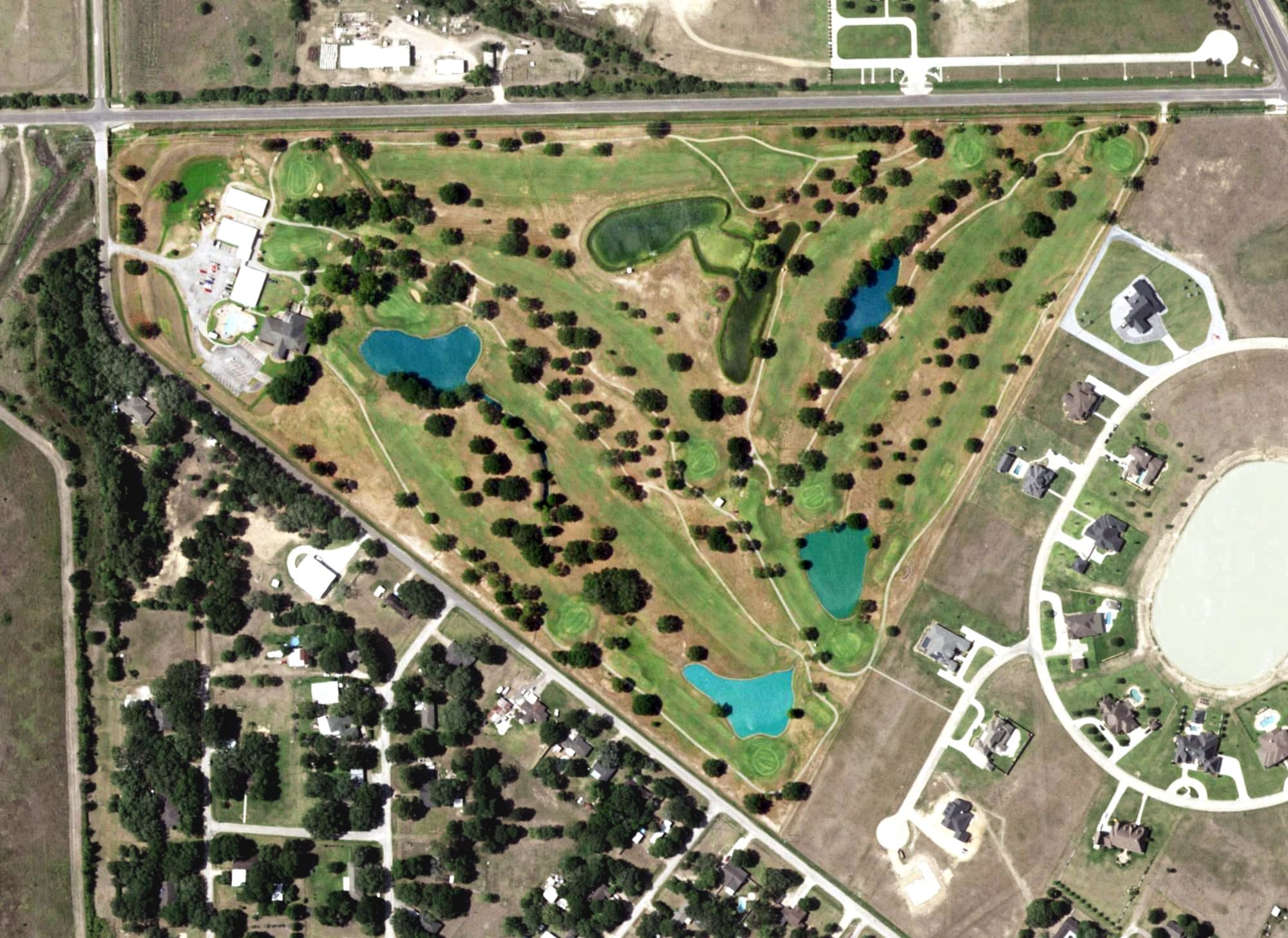 Aerial view of El Campo Country Club, TX, with its hole routing marked