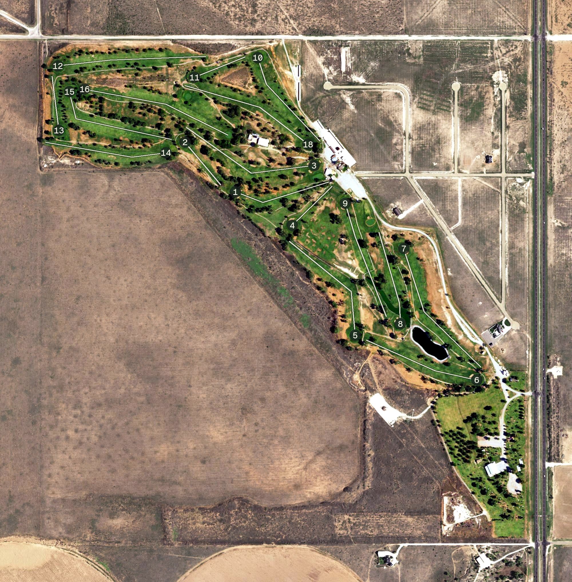Aerial view of Gaines County Golf Course, TX, with its hole routing marked