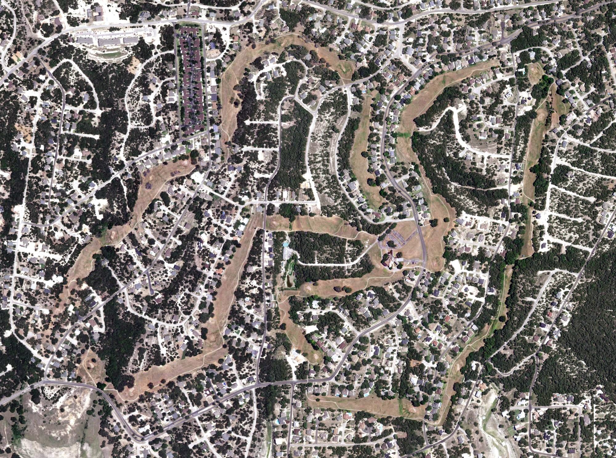 Aerial view of Highland Lakes Golf Course, TX, with its hole routing marked