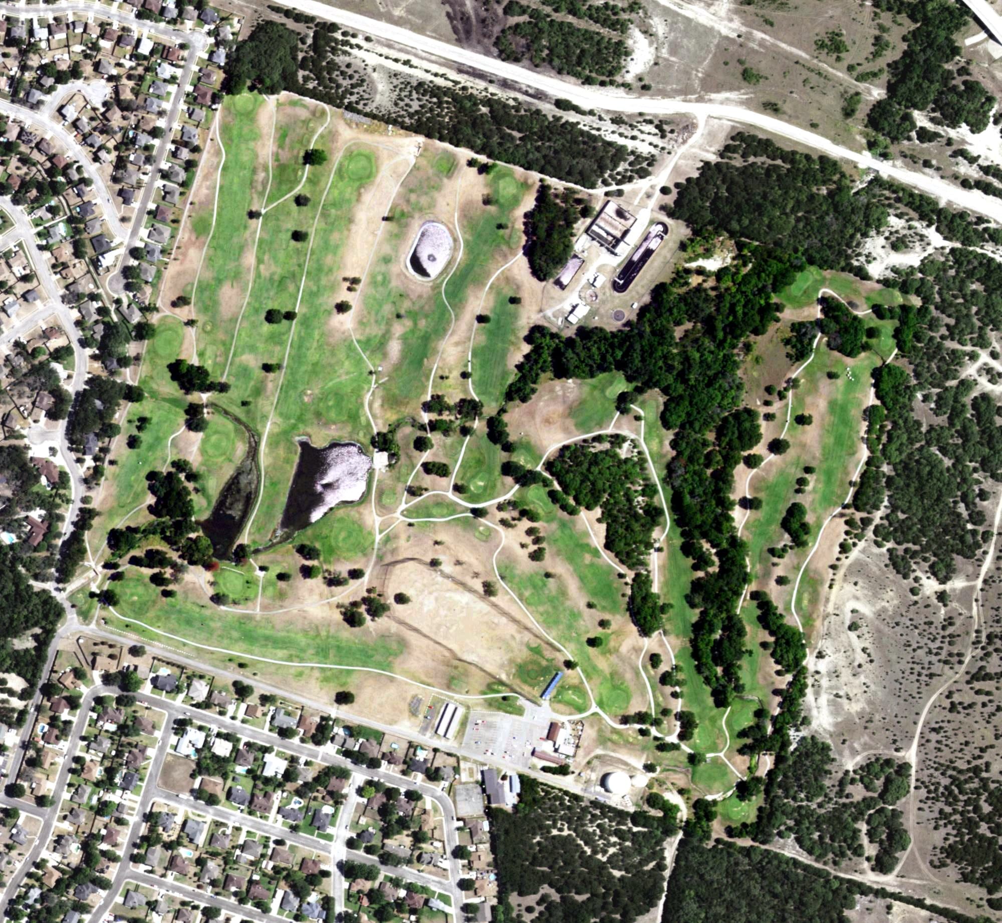 Aerial view of Hills of Cove Golf Course, TX, with its hole routing marked