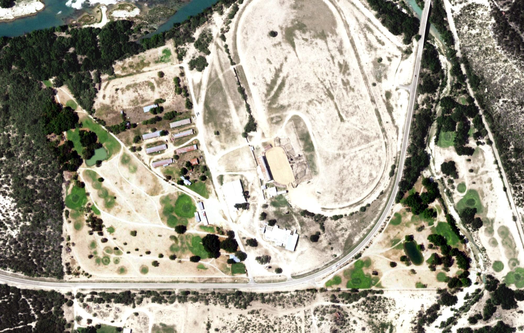Aerial view of Junction Golf Club, TX, with its hole routing marked