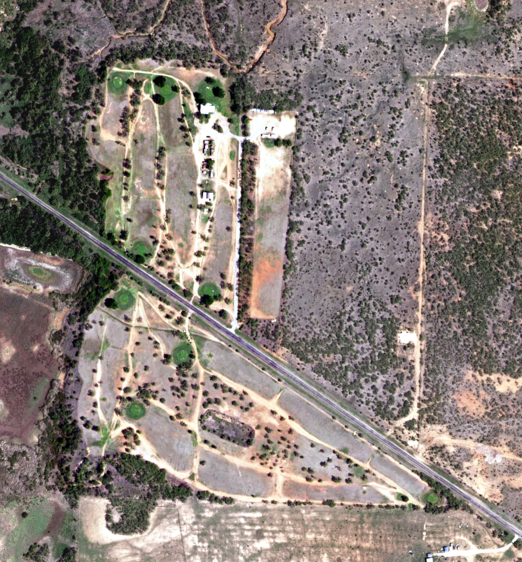 Aerial view of Lake Creek Golf Course, TX, with its hole routing marked