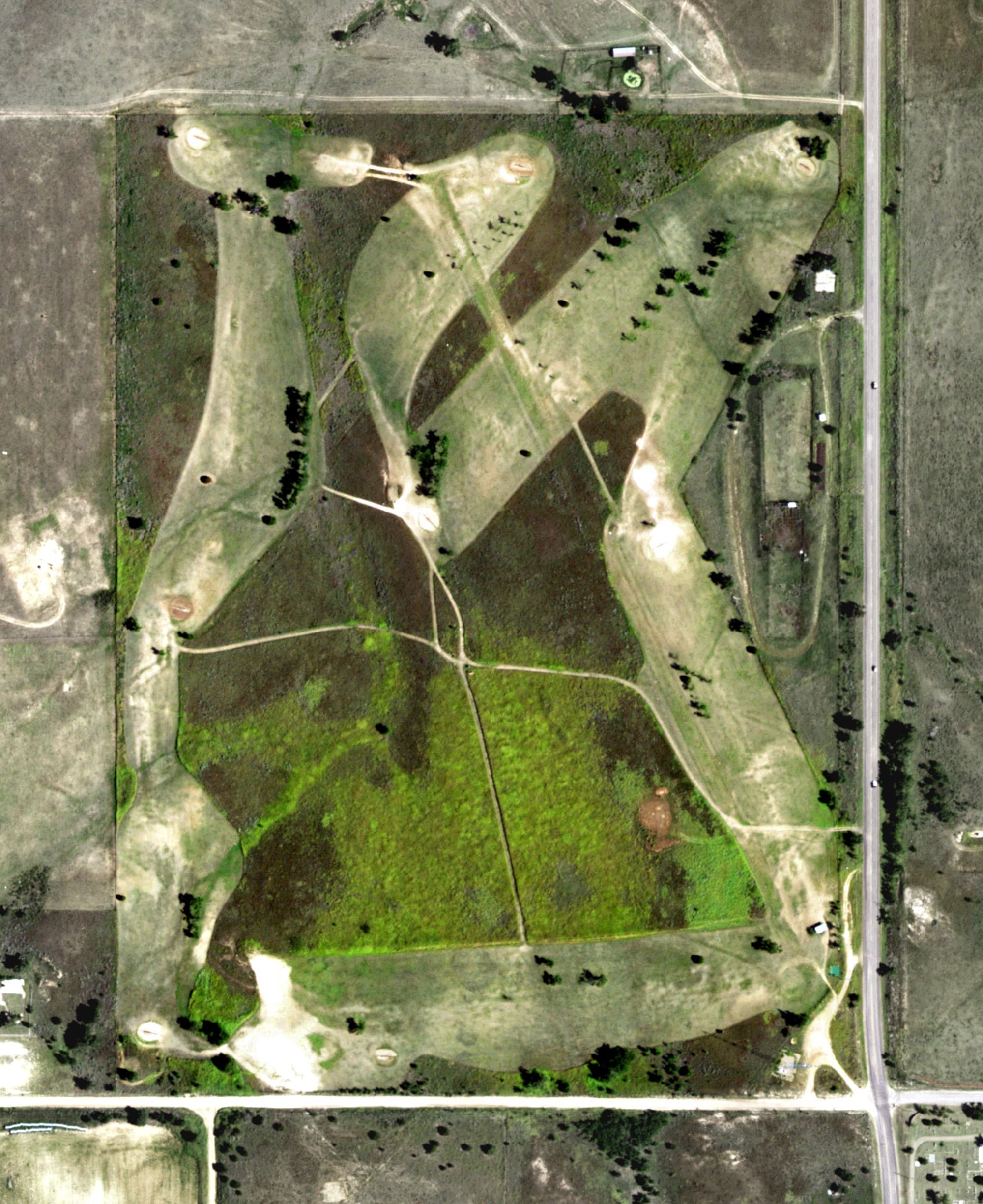 Aerial view of McLean Country Club, TX, with its hole routing marked