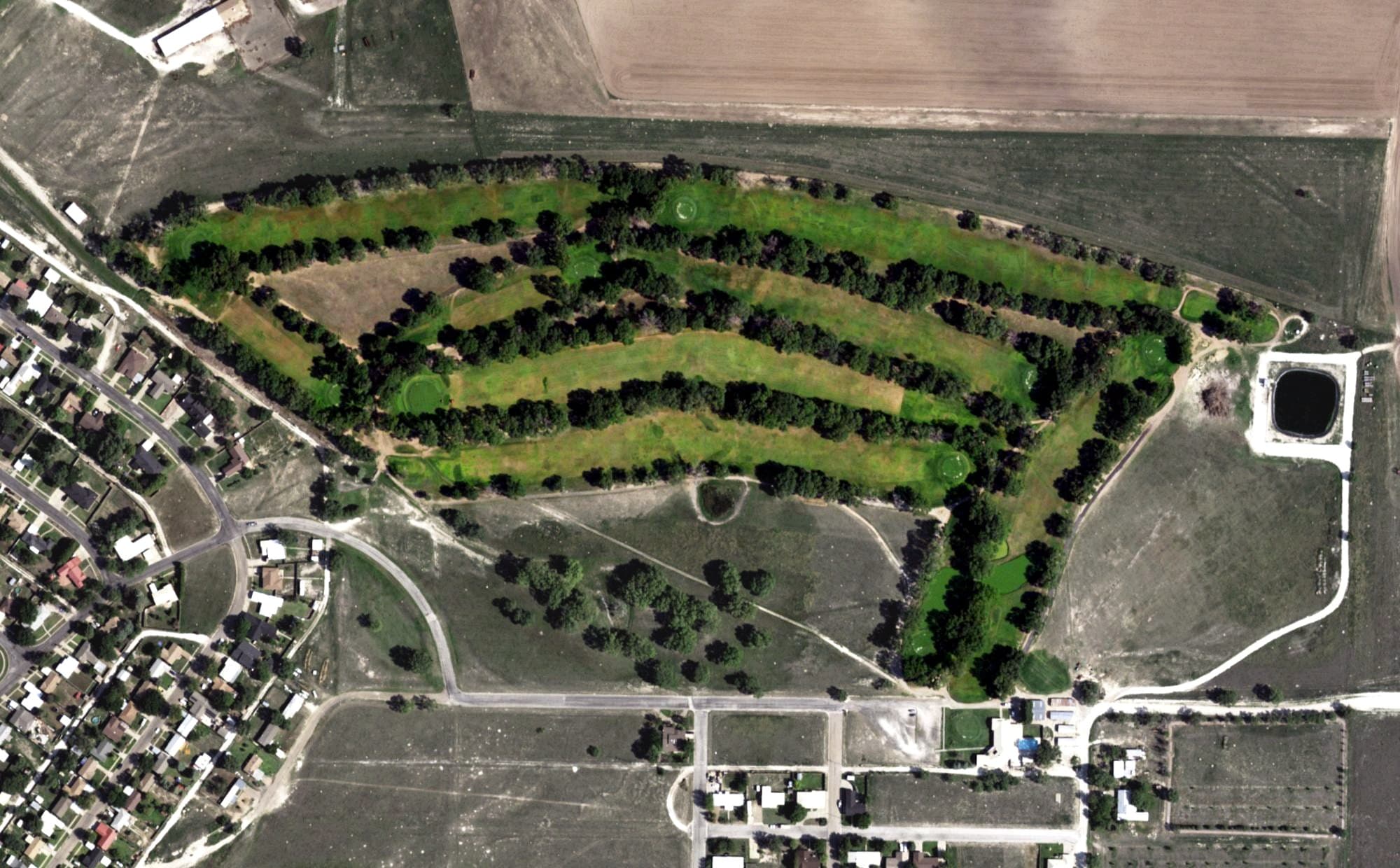 Aerial view of Muleshoe Golf & Country Club, TX, with its hole routing marked