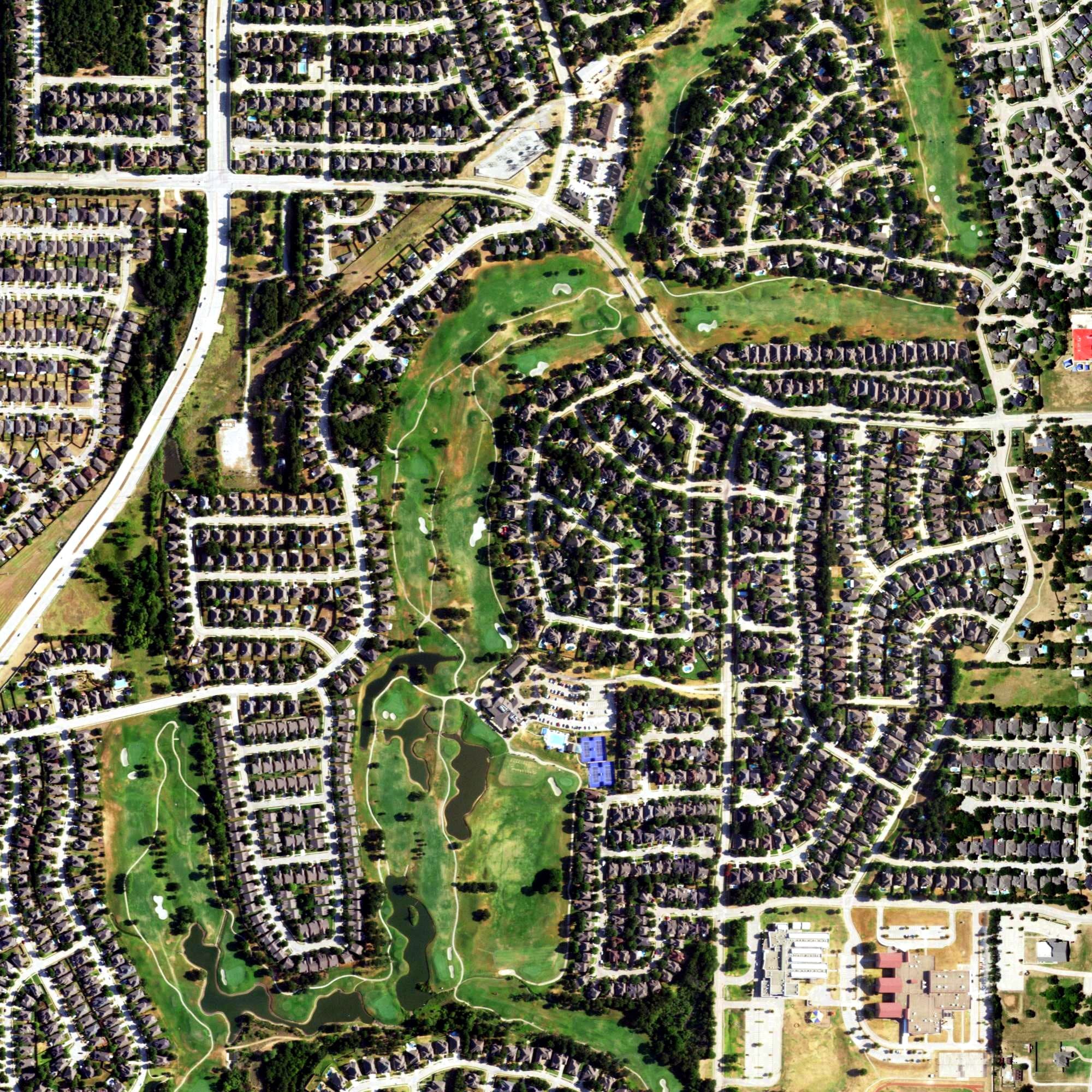 Aerial view of Oakmont Country Club, TX, with its hole routing marked