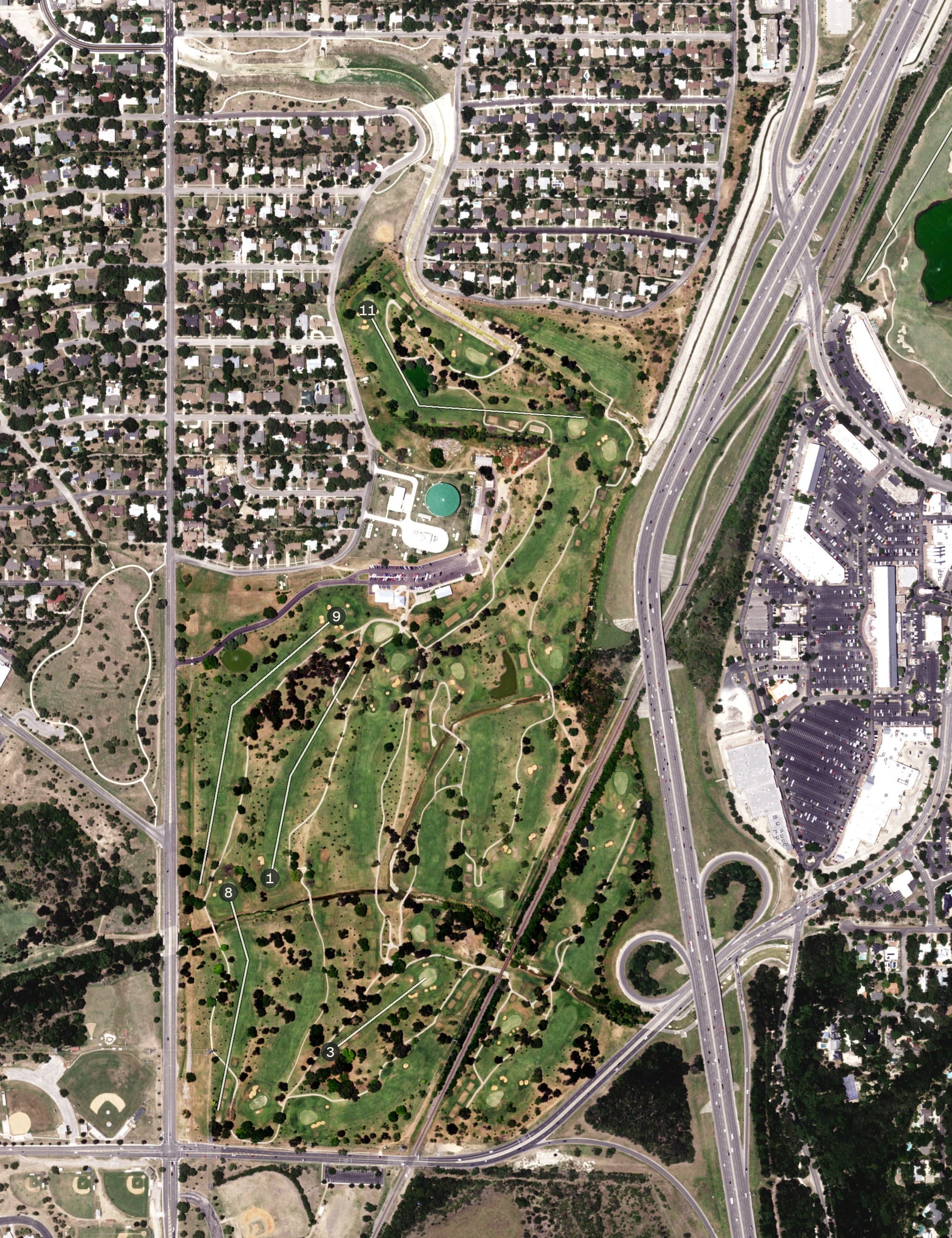 Aerial view of Olmos Basin Golf Course, TX, with its hole routing marked