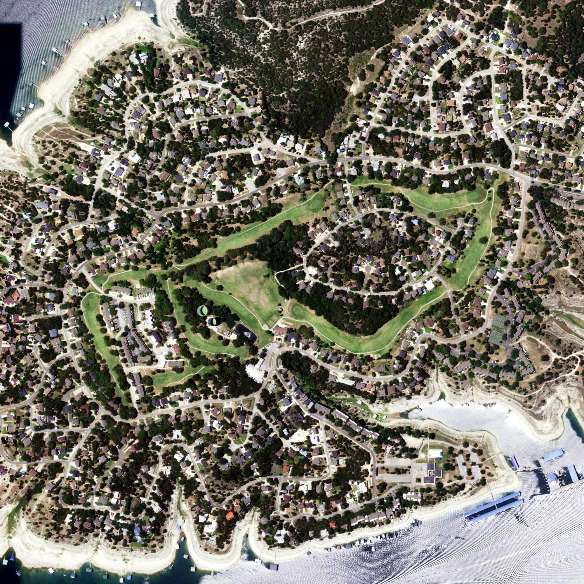 Aerial view of Point Venture Golf Club, TX, with its hole routing marked