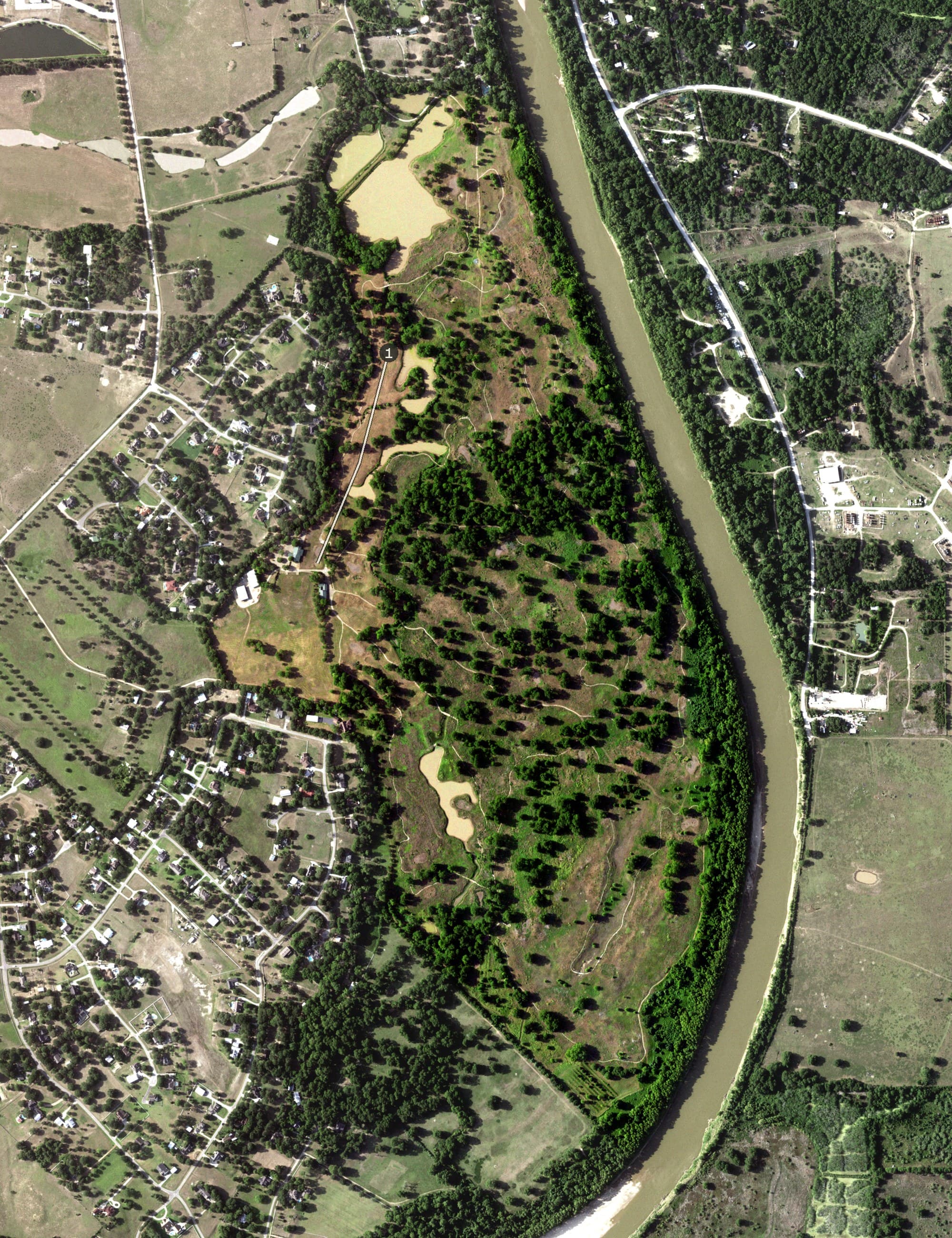 Aerial view of River Ridge Golf Club, TX, with its hole routing marked