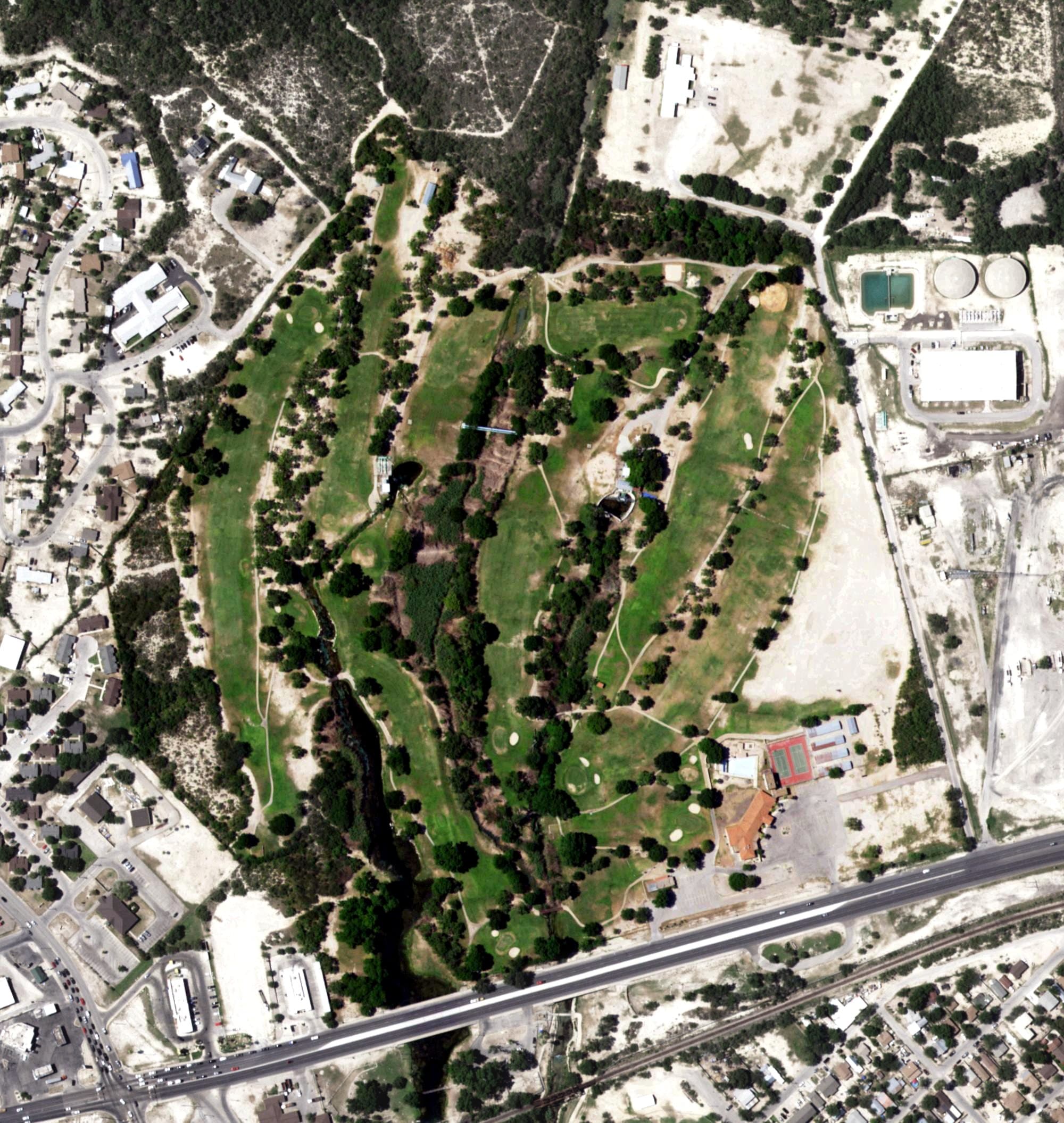 Aerial view of San Felipe Springs Golf Course, TX, with its hole routing marked