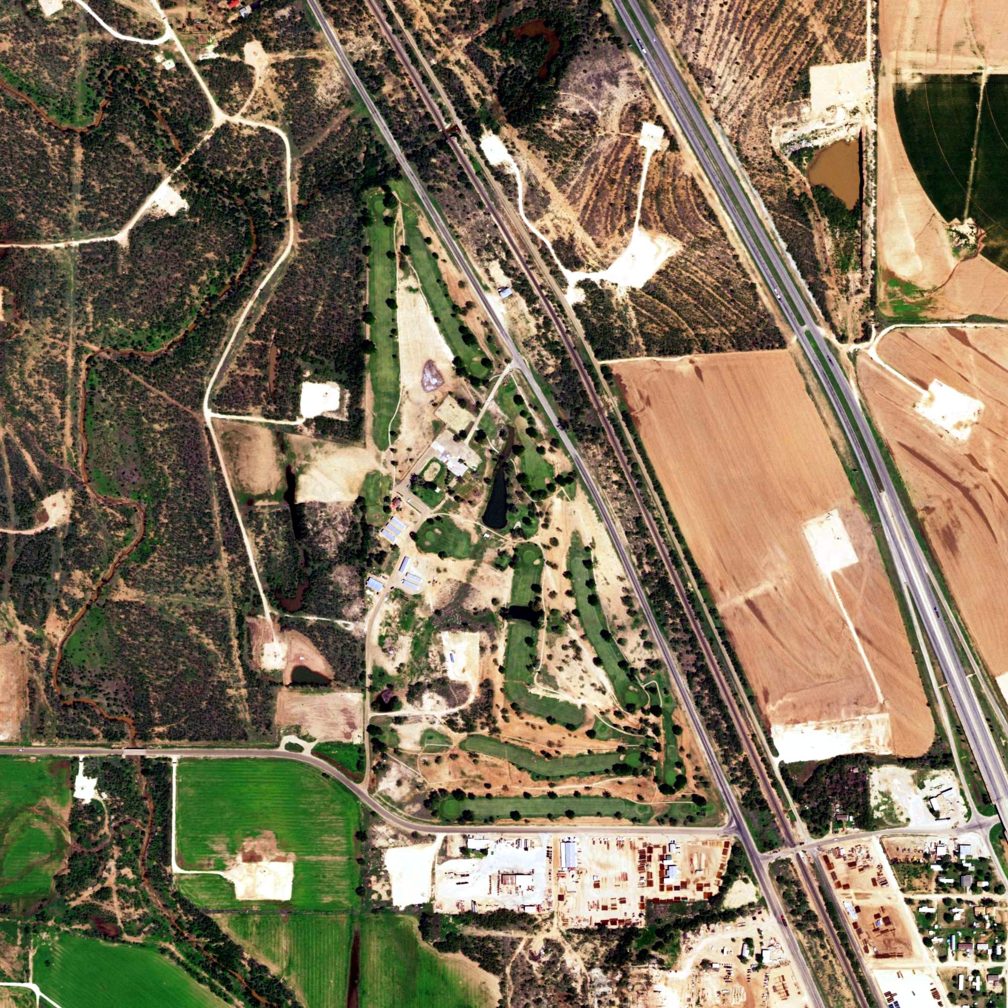 Aerial view of Scurry County Golf Course, TX, with its hole routing marked