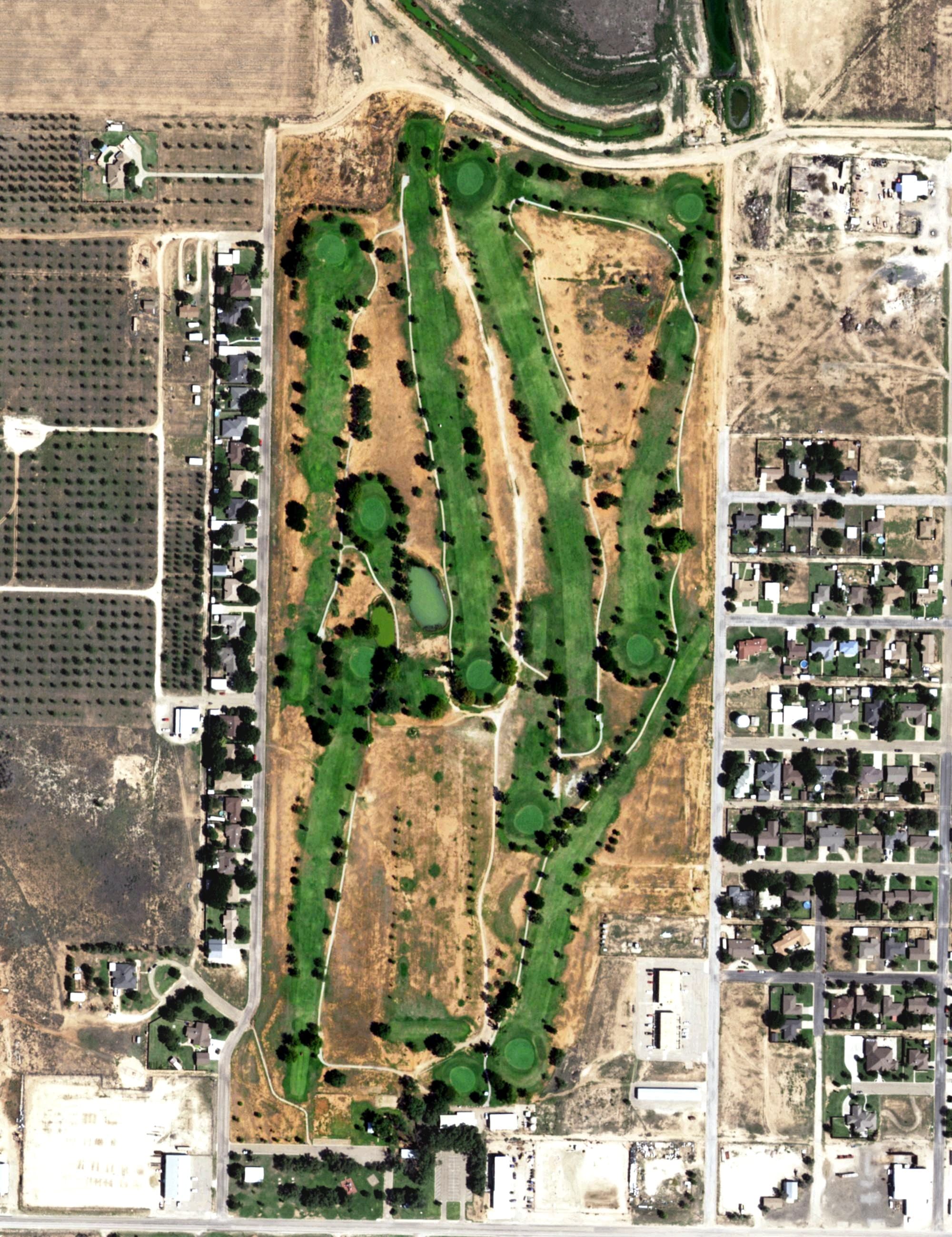 Aerial view of Sundown Municipal Golf Course, TX, with its hole routing marked