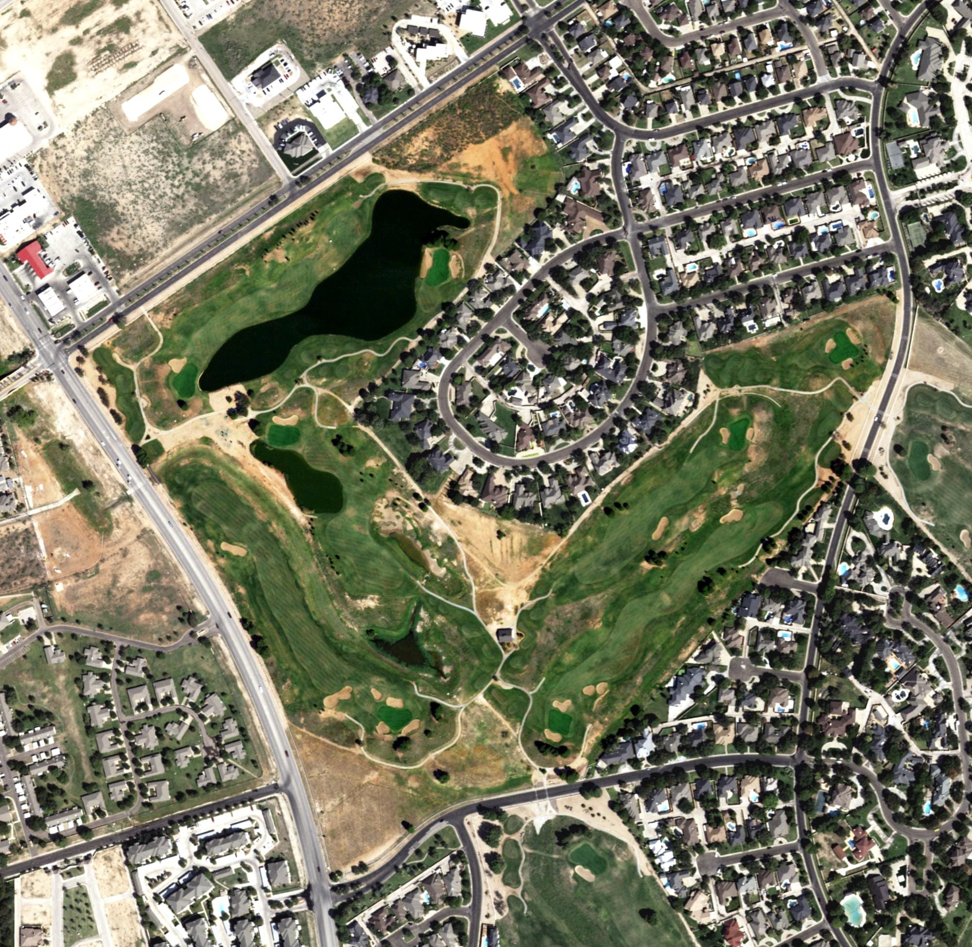 Aerial view of The Links Course at The Odessa Country Club, TX, with its hole routing marked