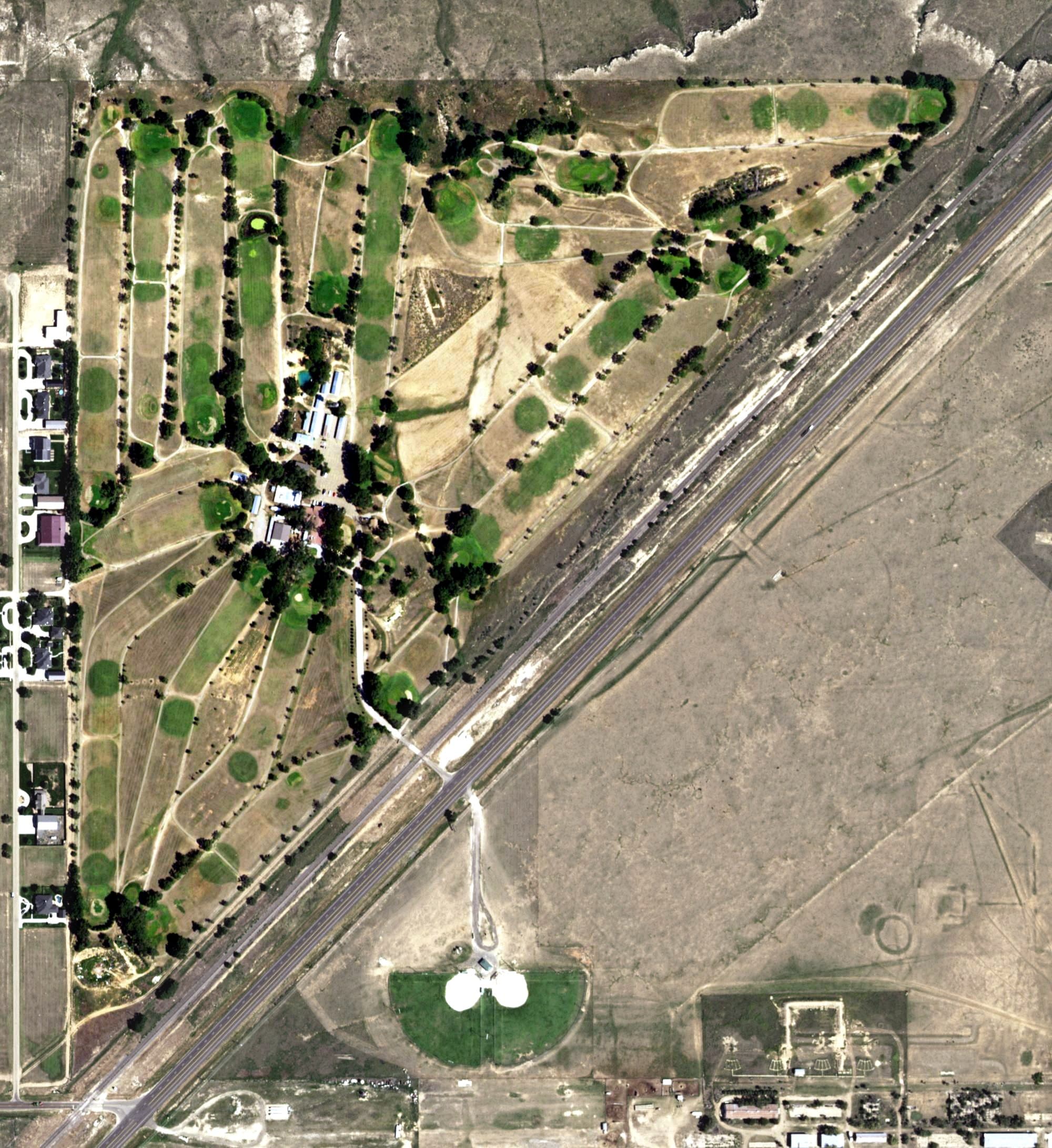 Aerial view of Twisted Elms Golf Club, TX, with its hole routing marked