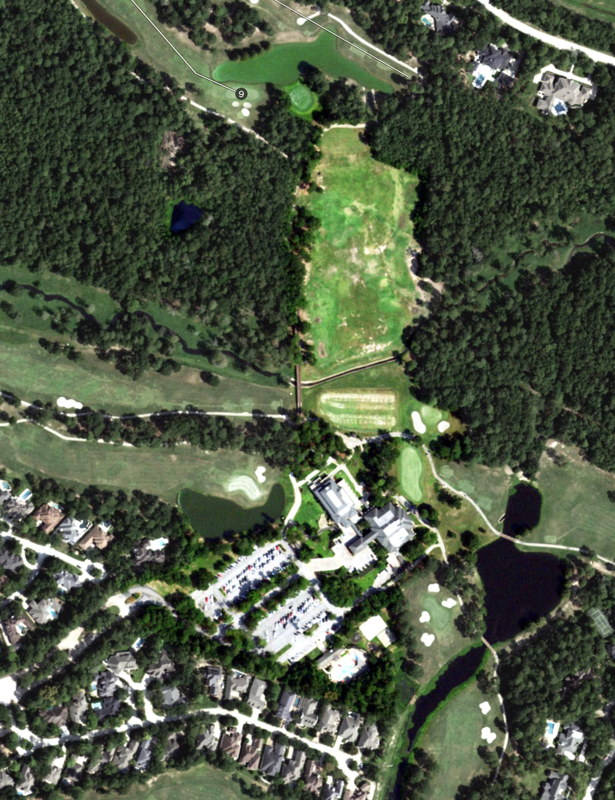 Aerial view of Woodlands Country Club - Palmer Course, TX, with its hole routing marked