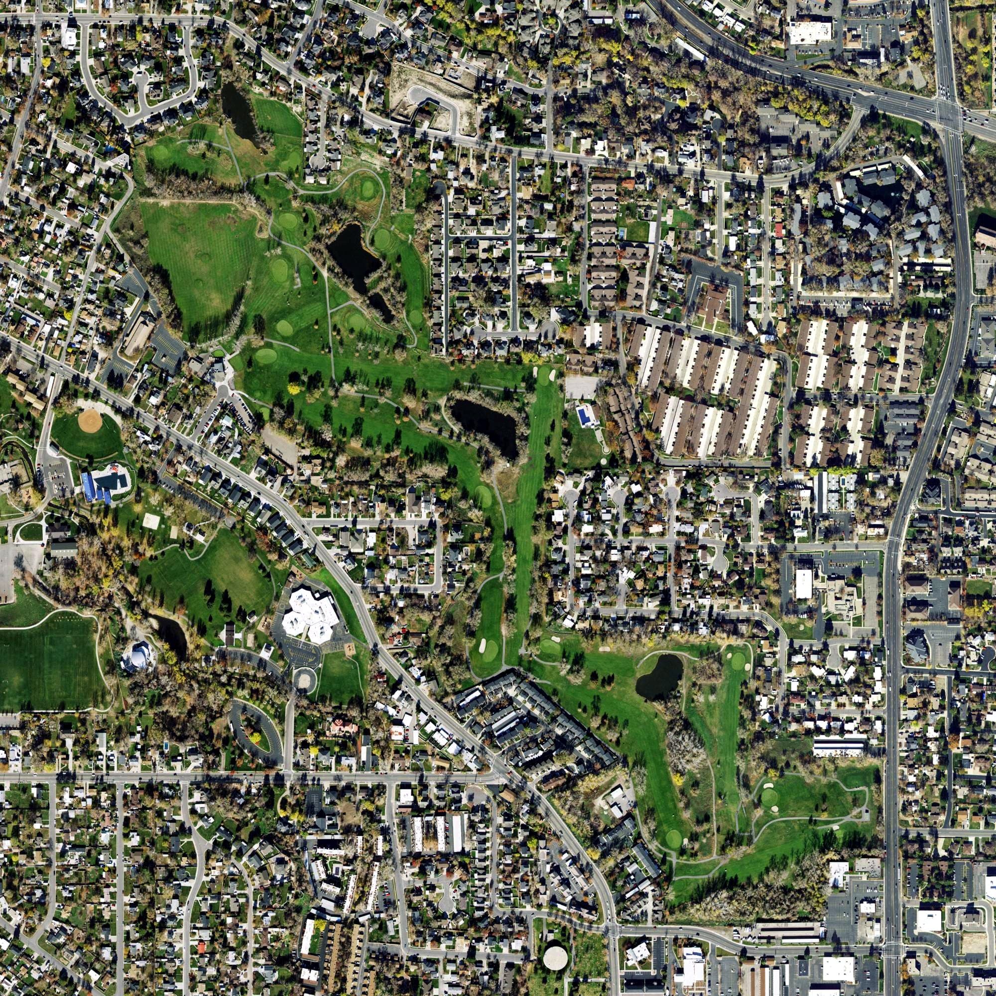 Aerial view of Mick Riley Golf Course, UT, with its hole routing marked