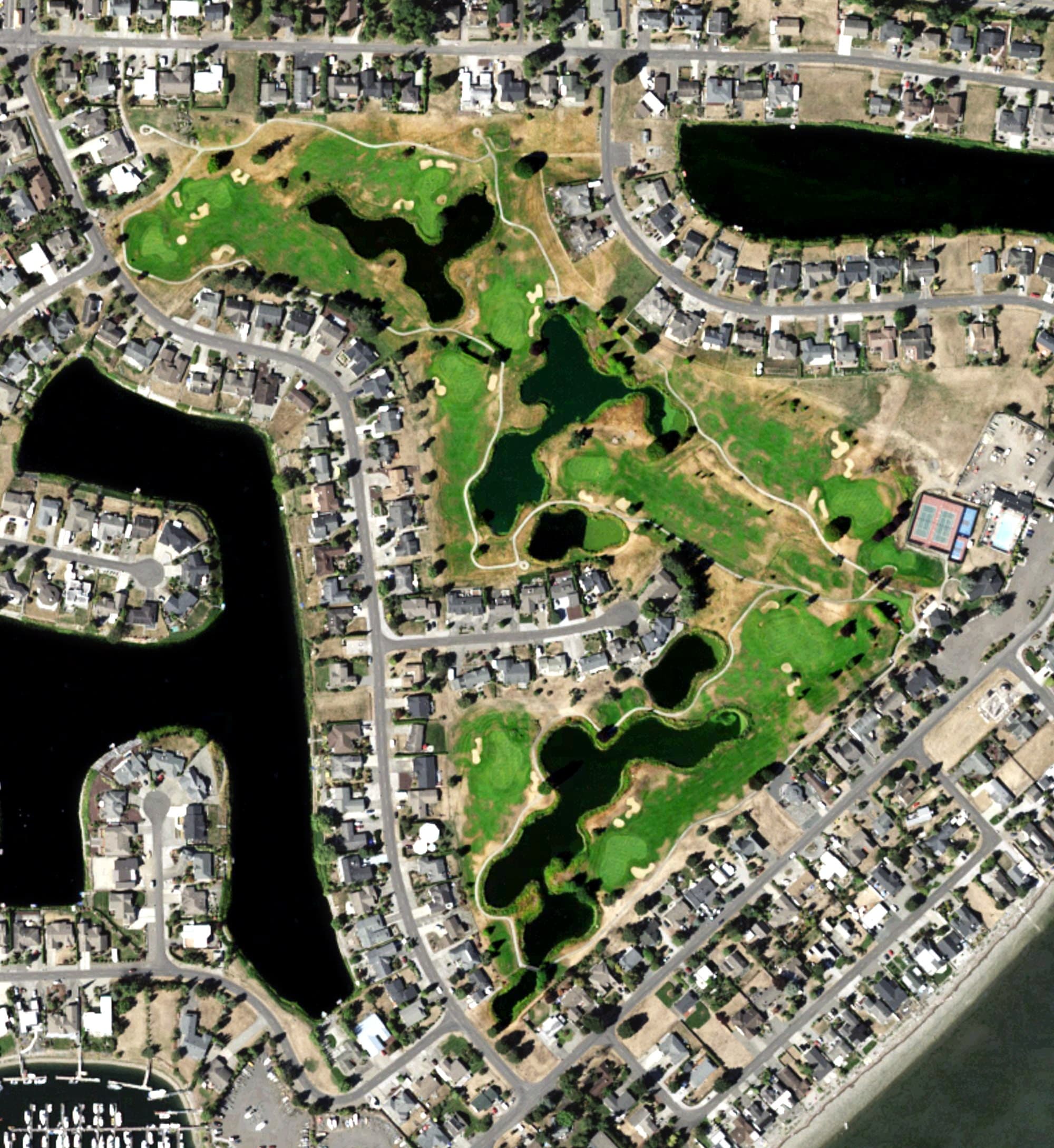 Aerial view of Birch Bay Village Golf Course, WA, with its hole routing marked