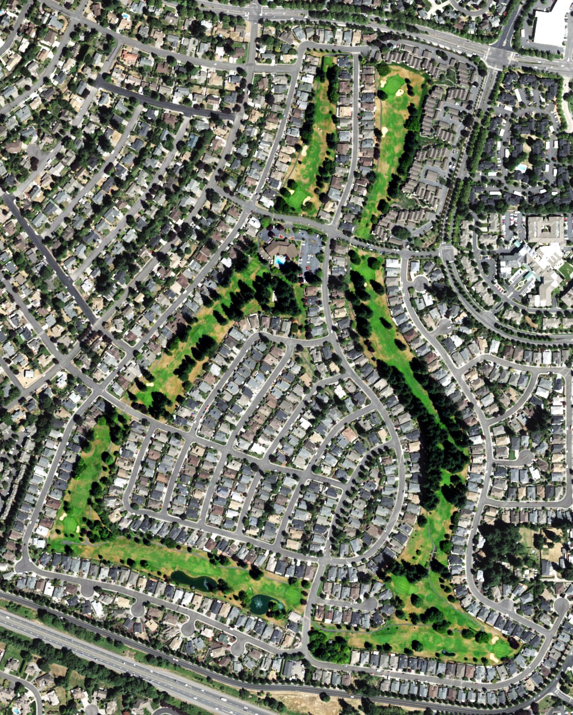 Aerial view of Fairway Village Golf Course, WA, with its hole routing marked