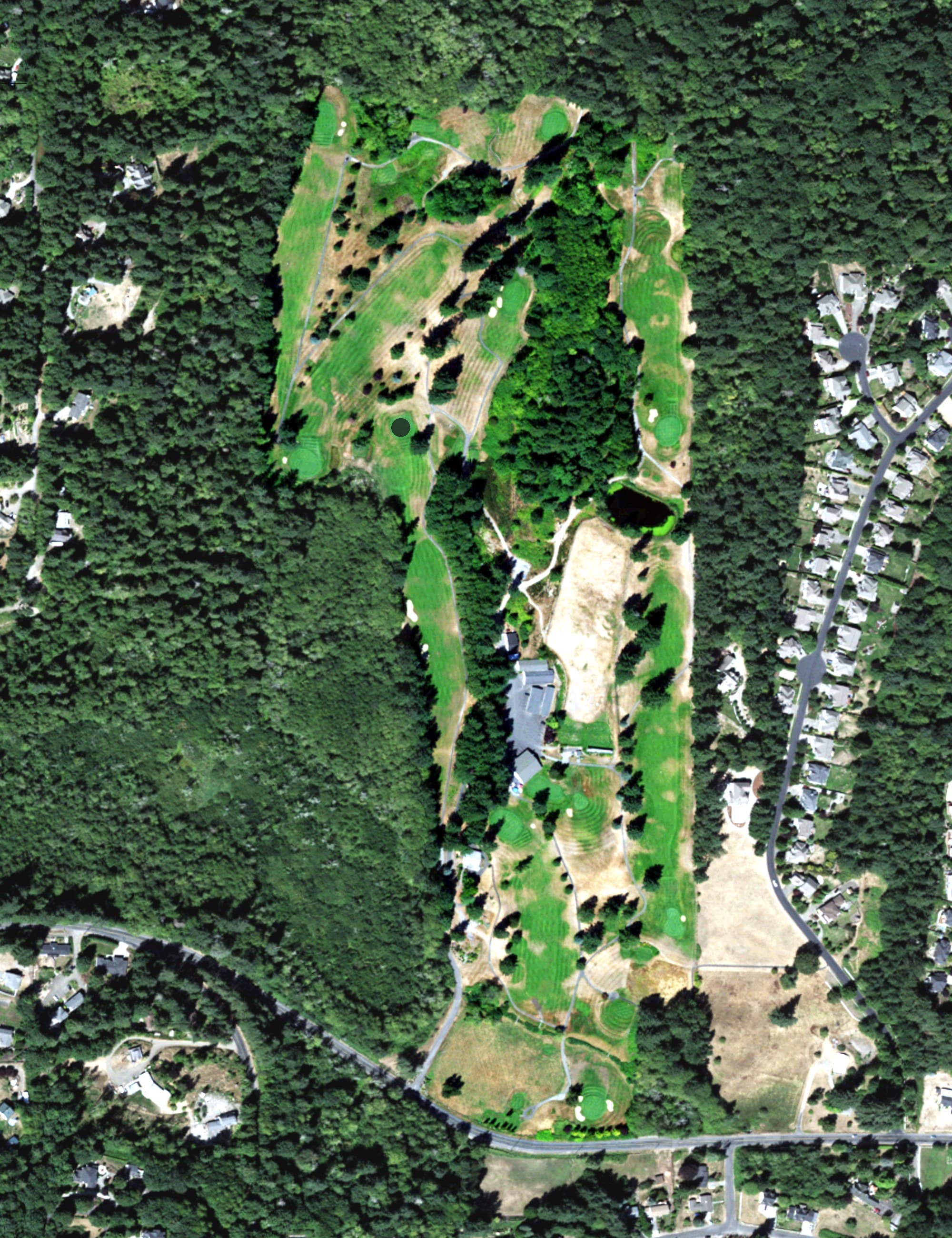 Aerial view of Gig Harbor Golf & Country Club, WA, with its hole routing marked