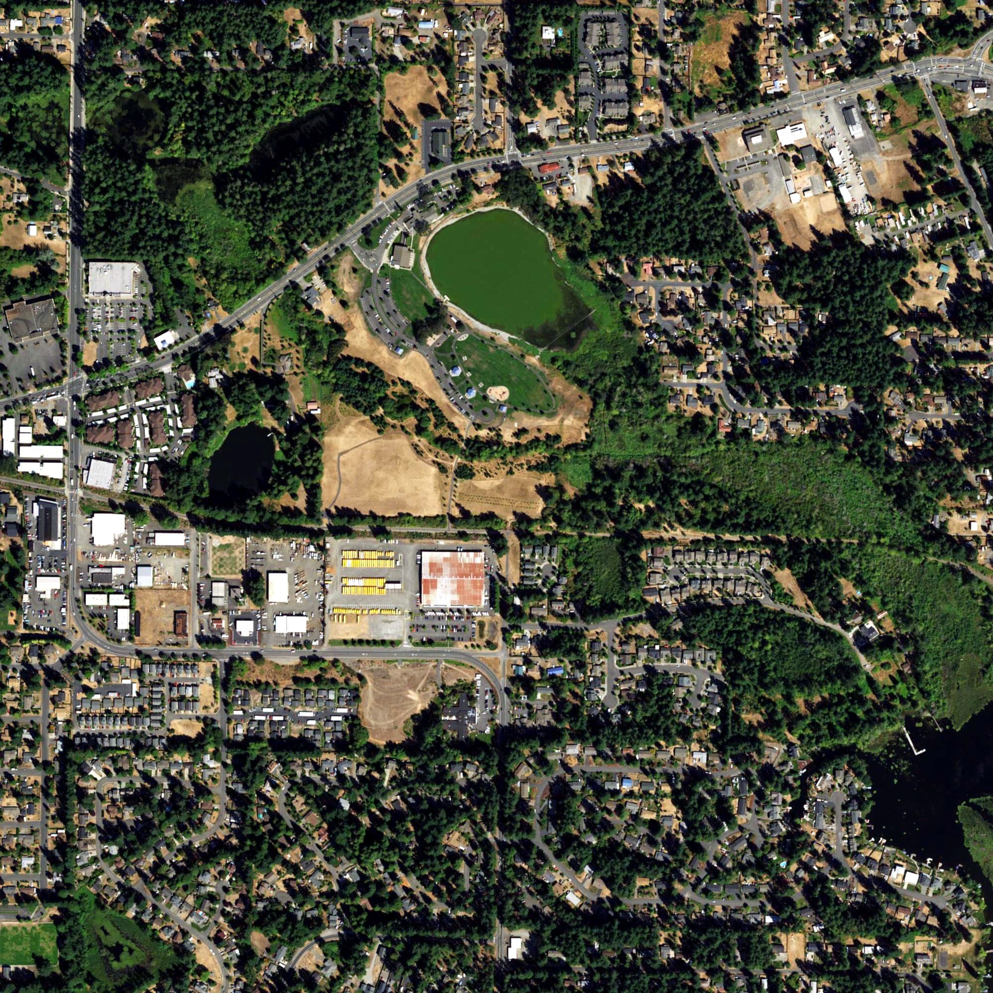 Aerial view of Woodland Creek Disc Golf Course, WA, with its hole routing marked