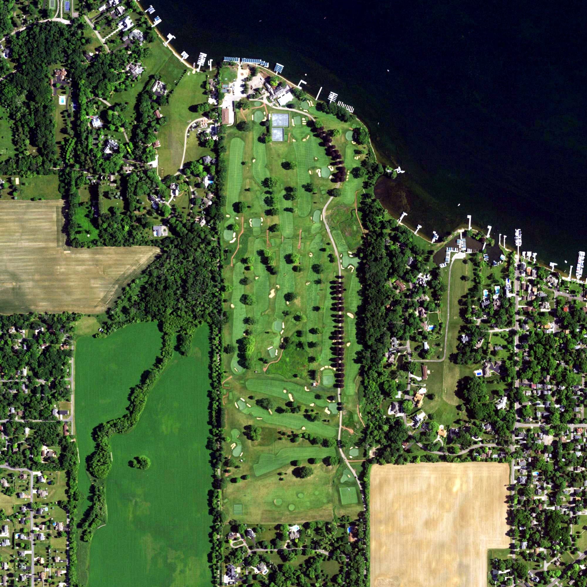 Aerial view of Lake Geneva Country Club, WI, with its hole routing marked