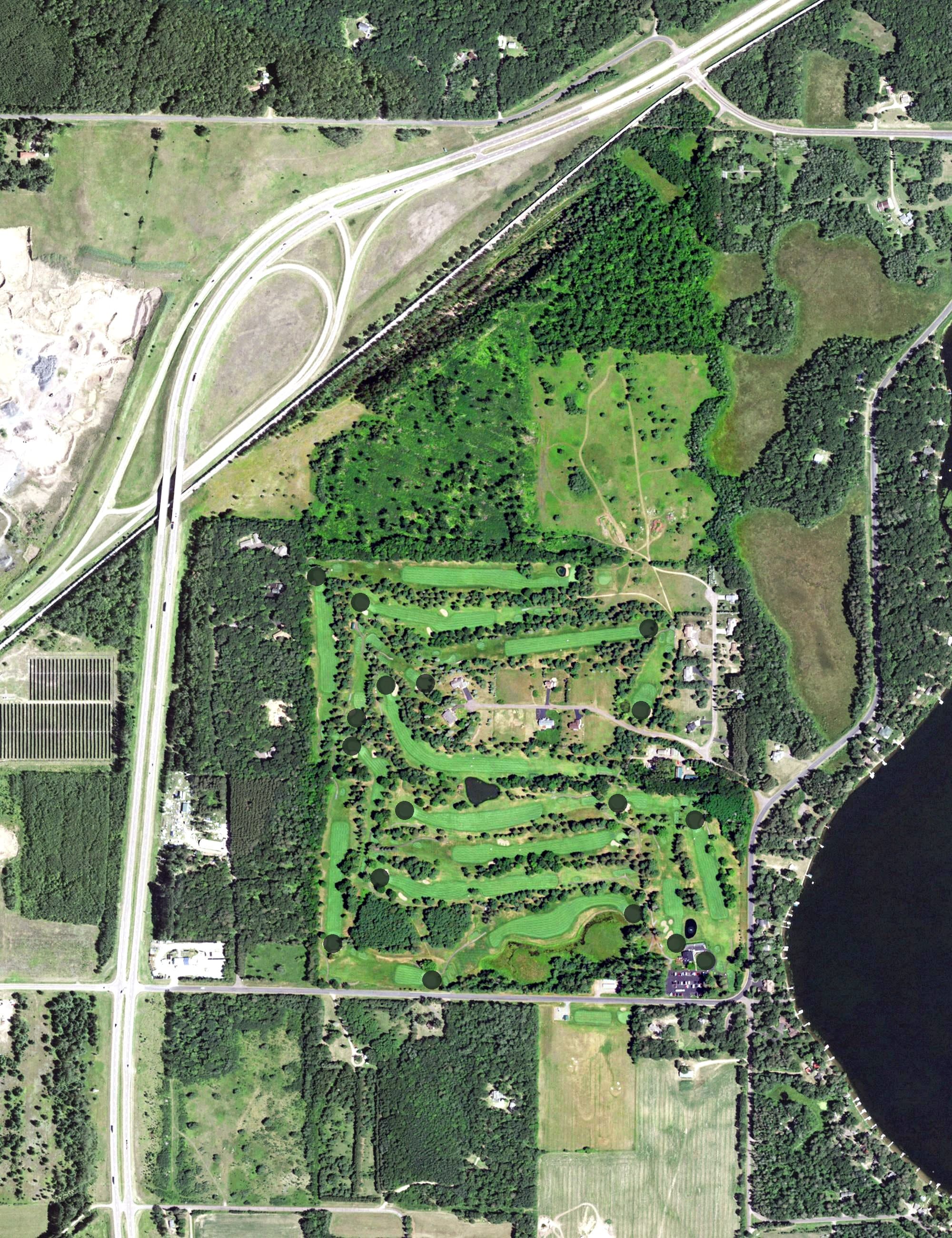 Aerial view of Spooner Golf Club, WI, with its hole routing marked
