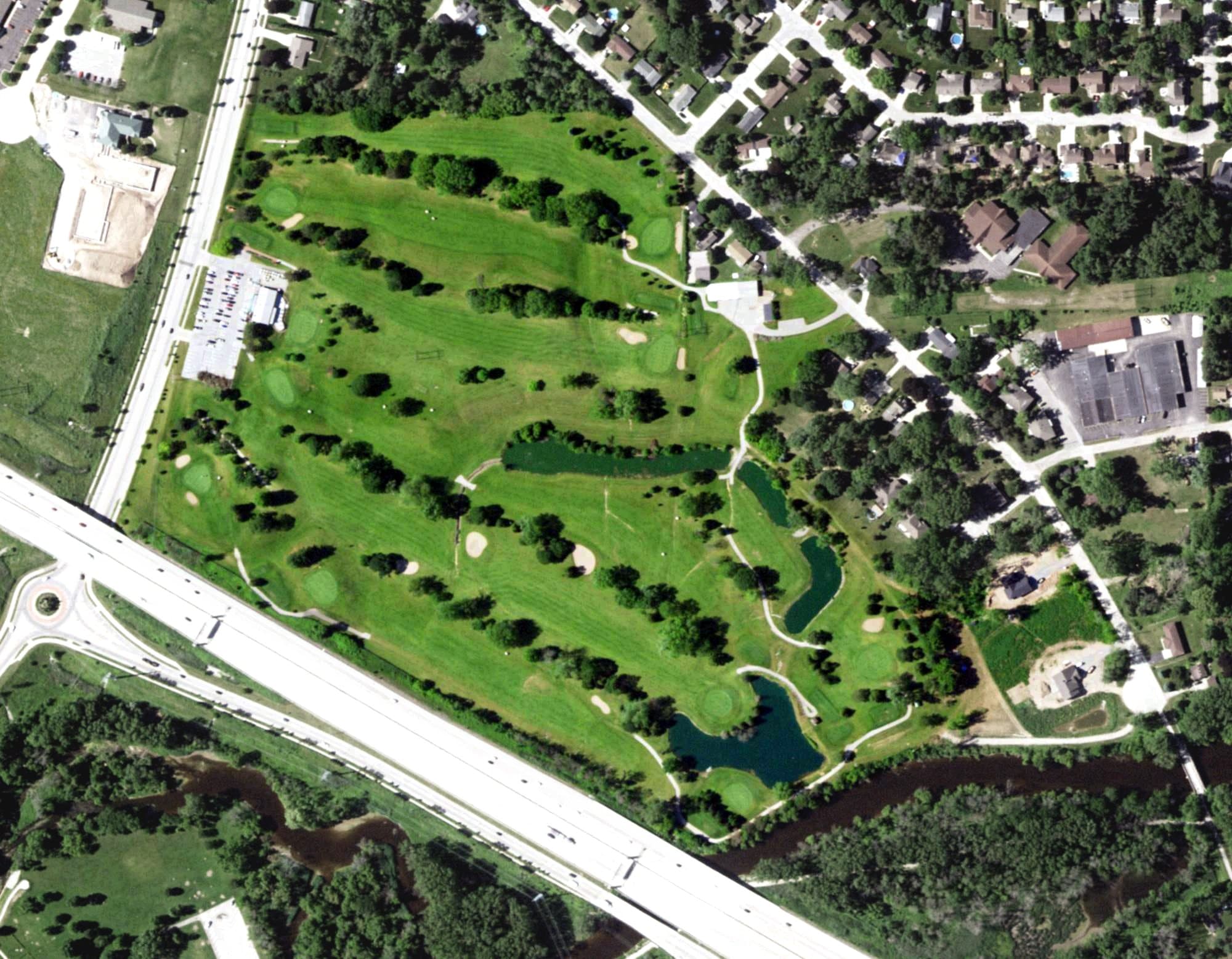 Aerial view of Village Green Golf Course, WI, with its hole routing marked