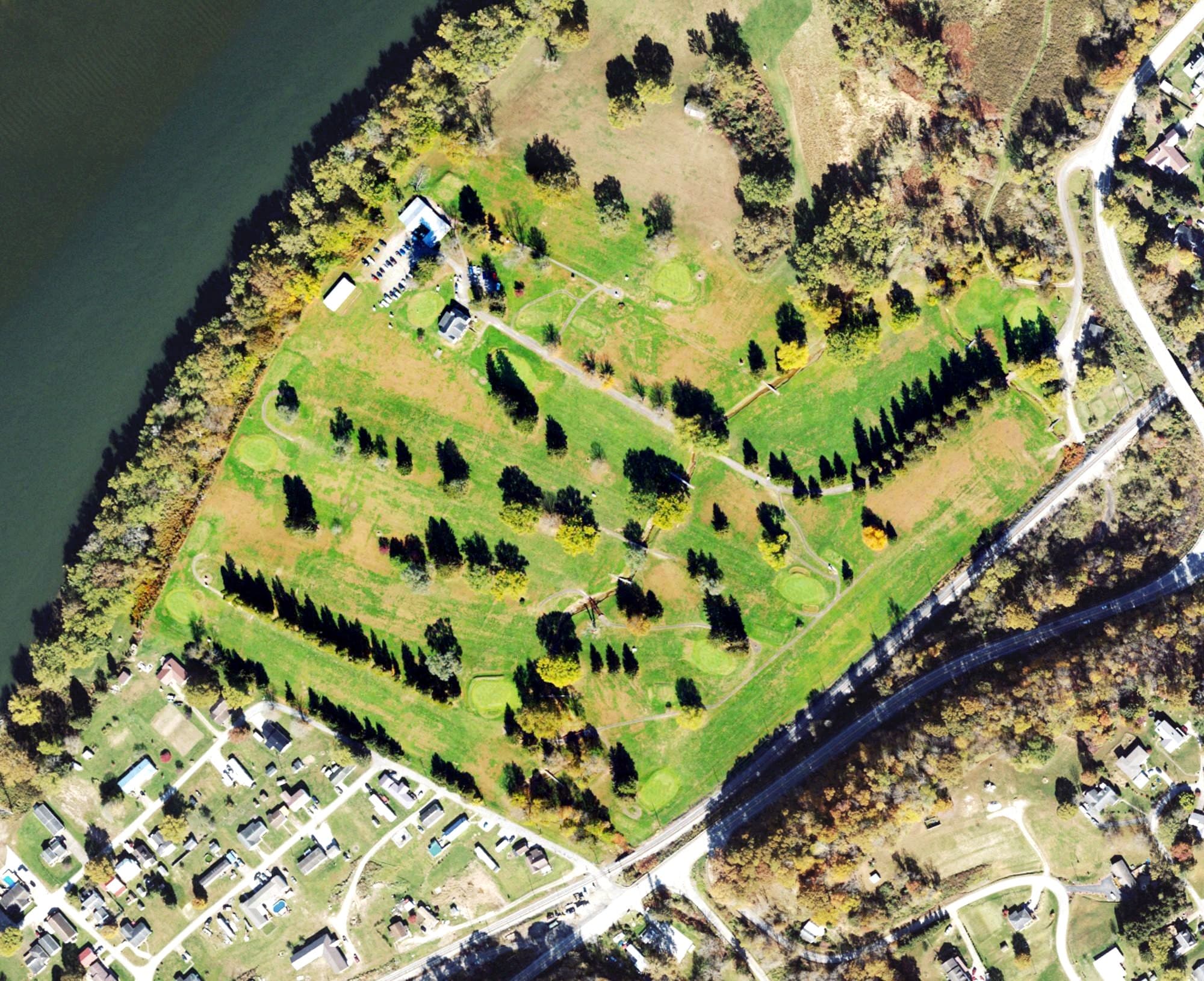 Aerial view of Sistersville Country Club Golf Course, WV, with its hole routing marked
