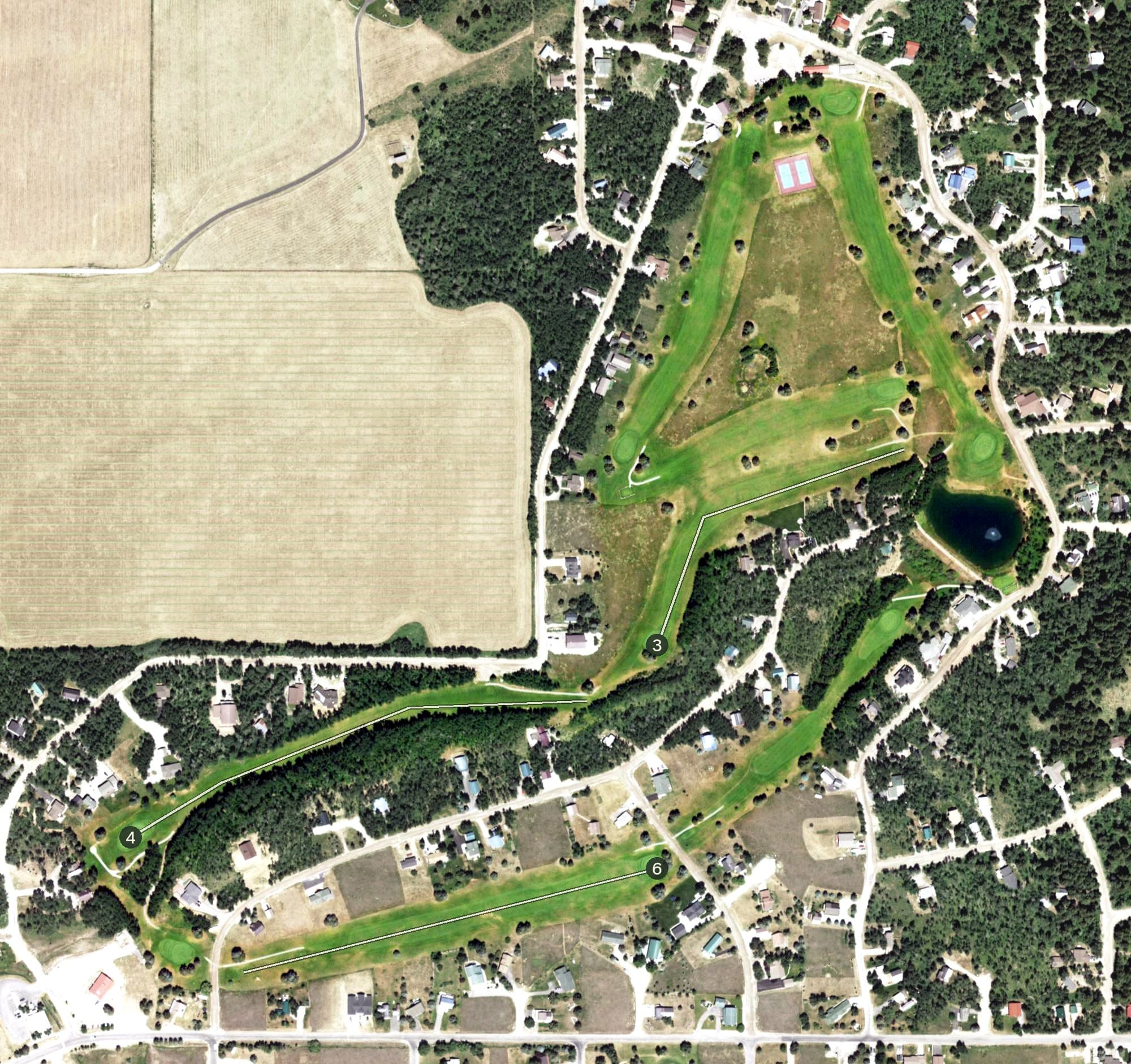 Aerial view of Aspen Hills Golf Course, WY, with its hole routing marked