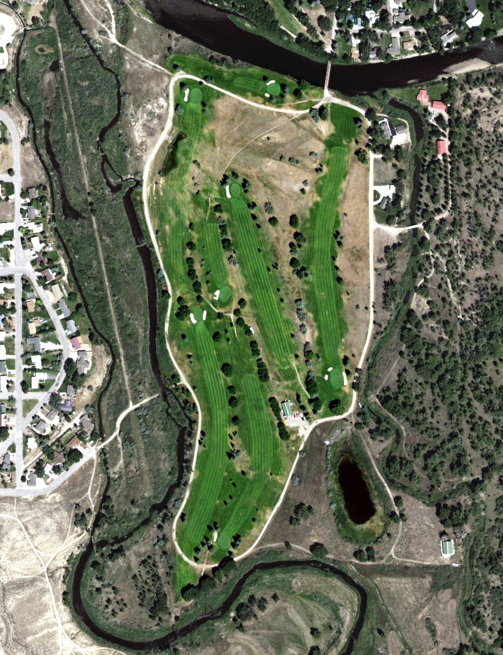 Aerial view of Saratoga Inn Golf Course, WY, with its hole routing marked
