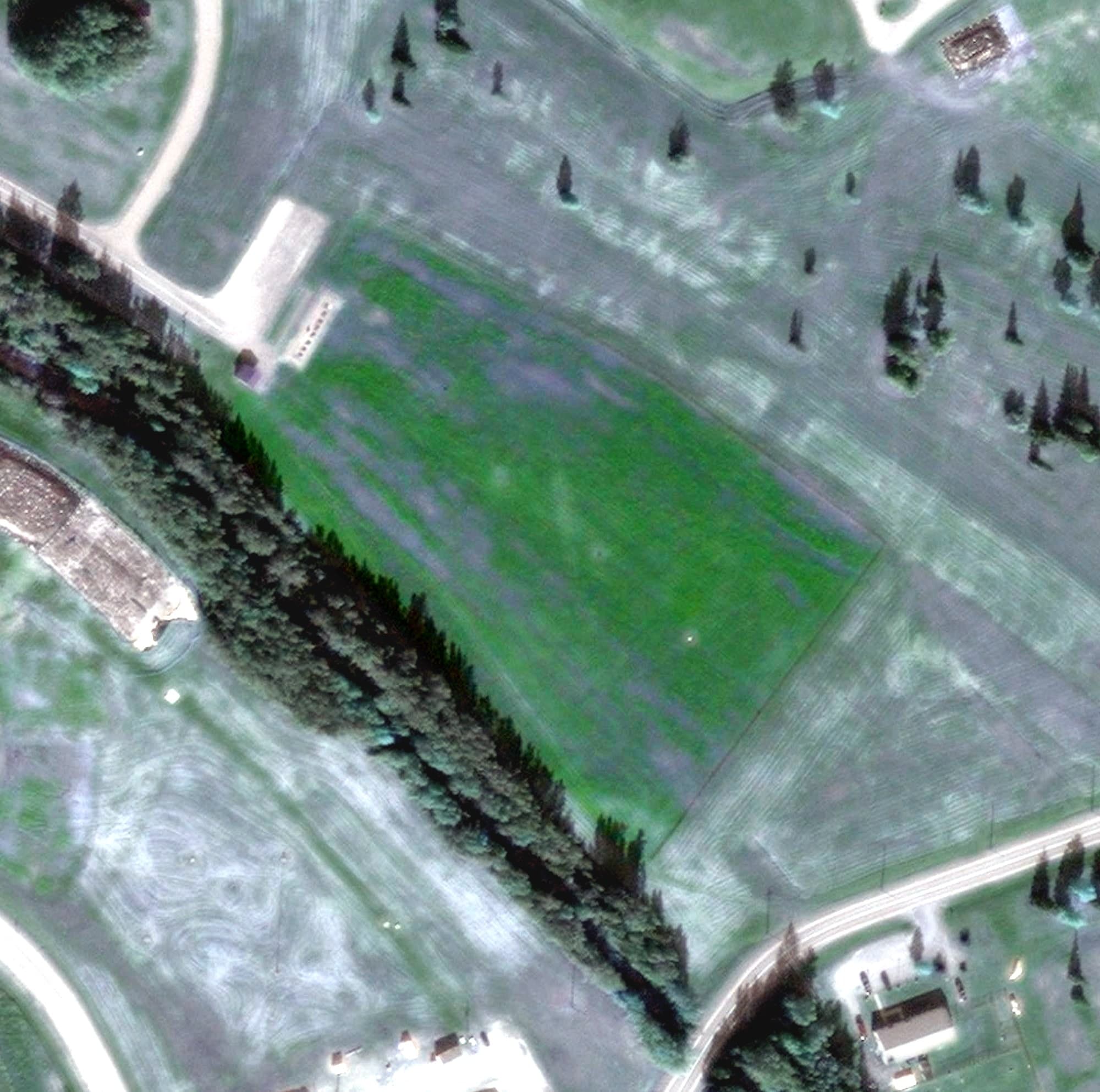 Aerial view of Driving range, AK, with its hole routing marked