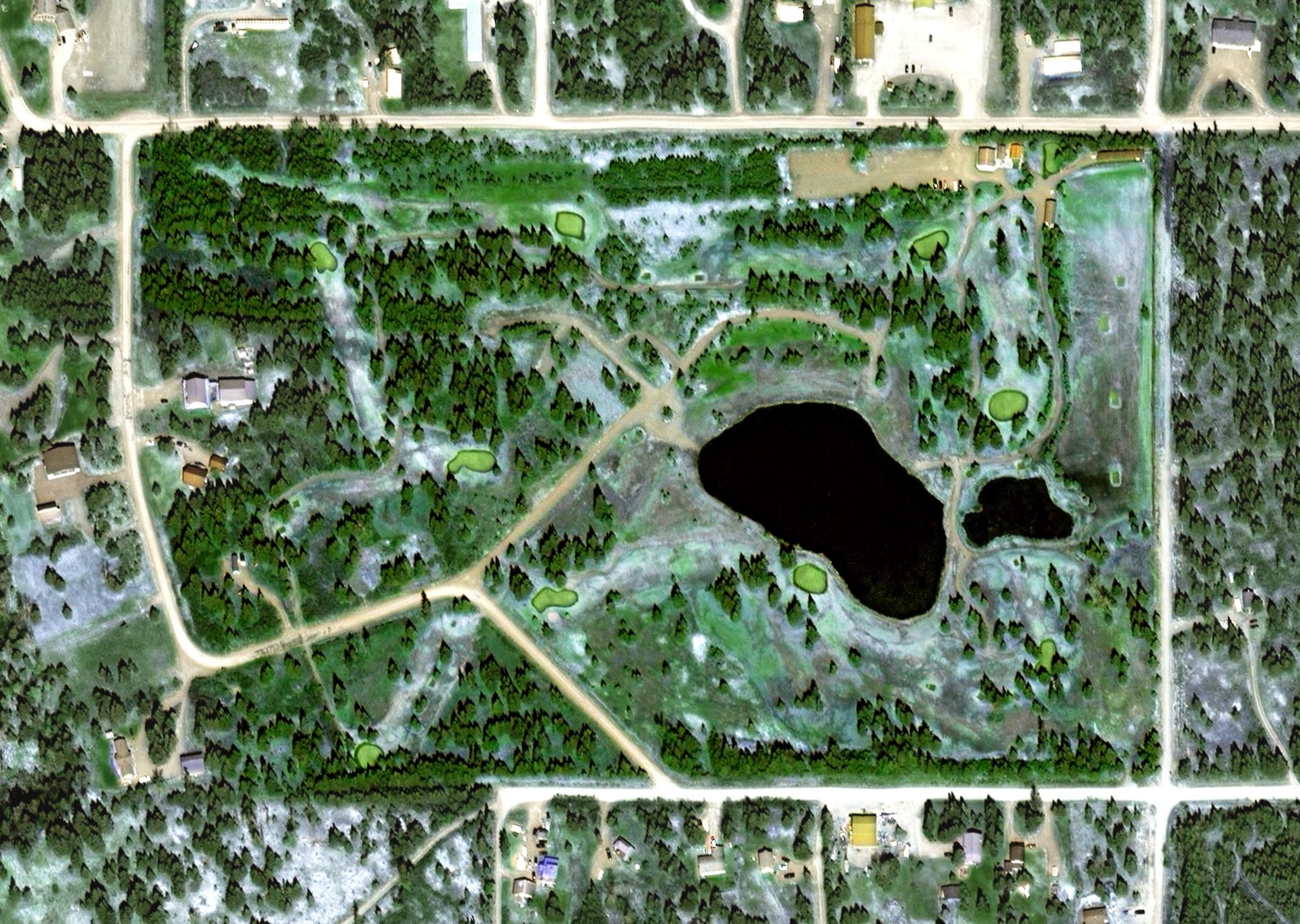 Aerial view of Fireweed Meadows Golf Course, AK, with its hole routing marked