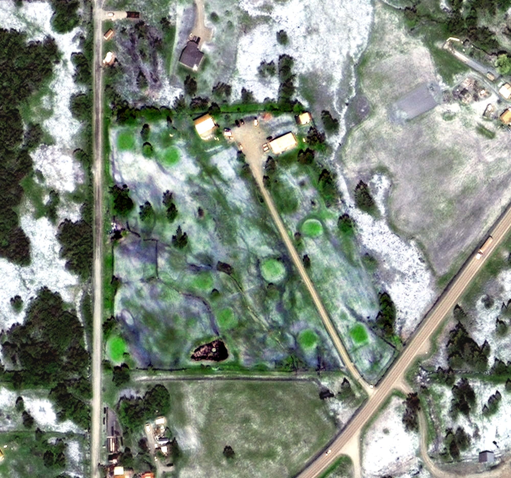 Aerial view of Homer Golf Course, AK, with its hole routing marked