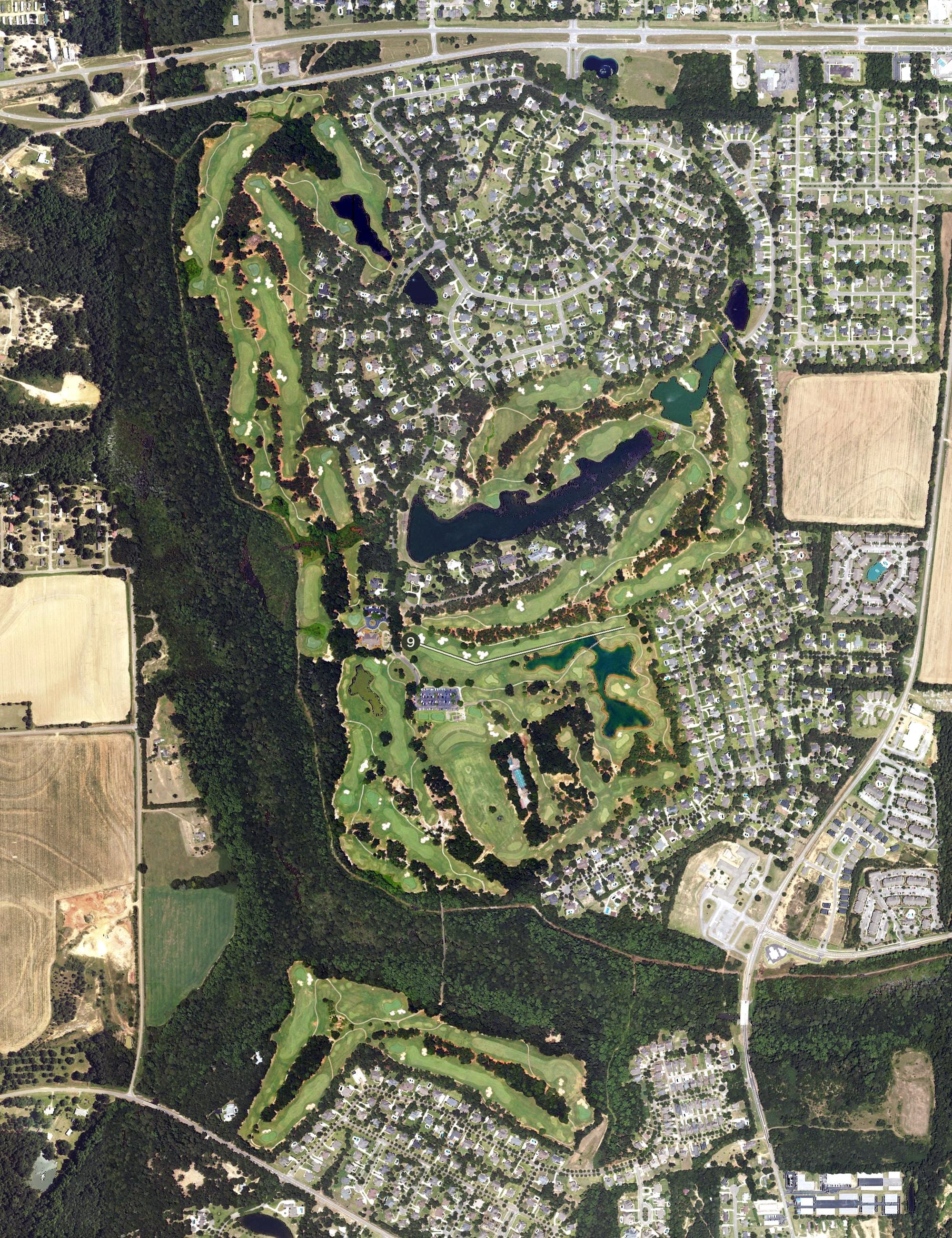 Aerial view of Highland Oaks Golf Course, AL, with its hole routing marked