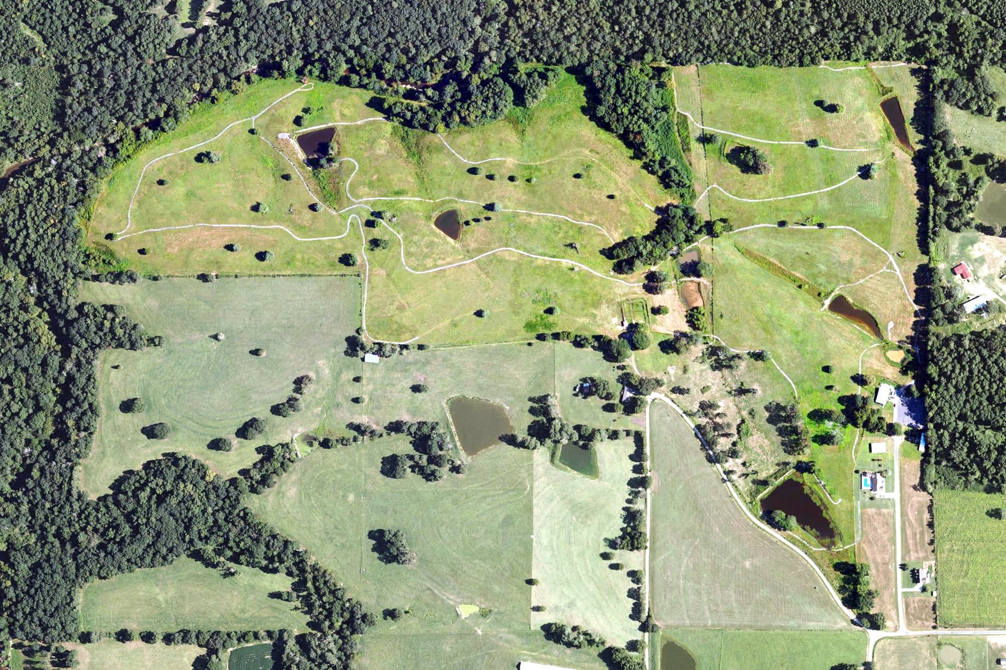 Aerial view of Slab Creek Golf Course, AL, with its hole routing marked