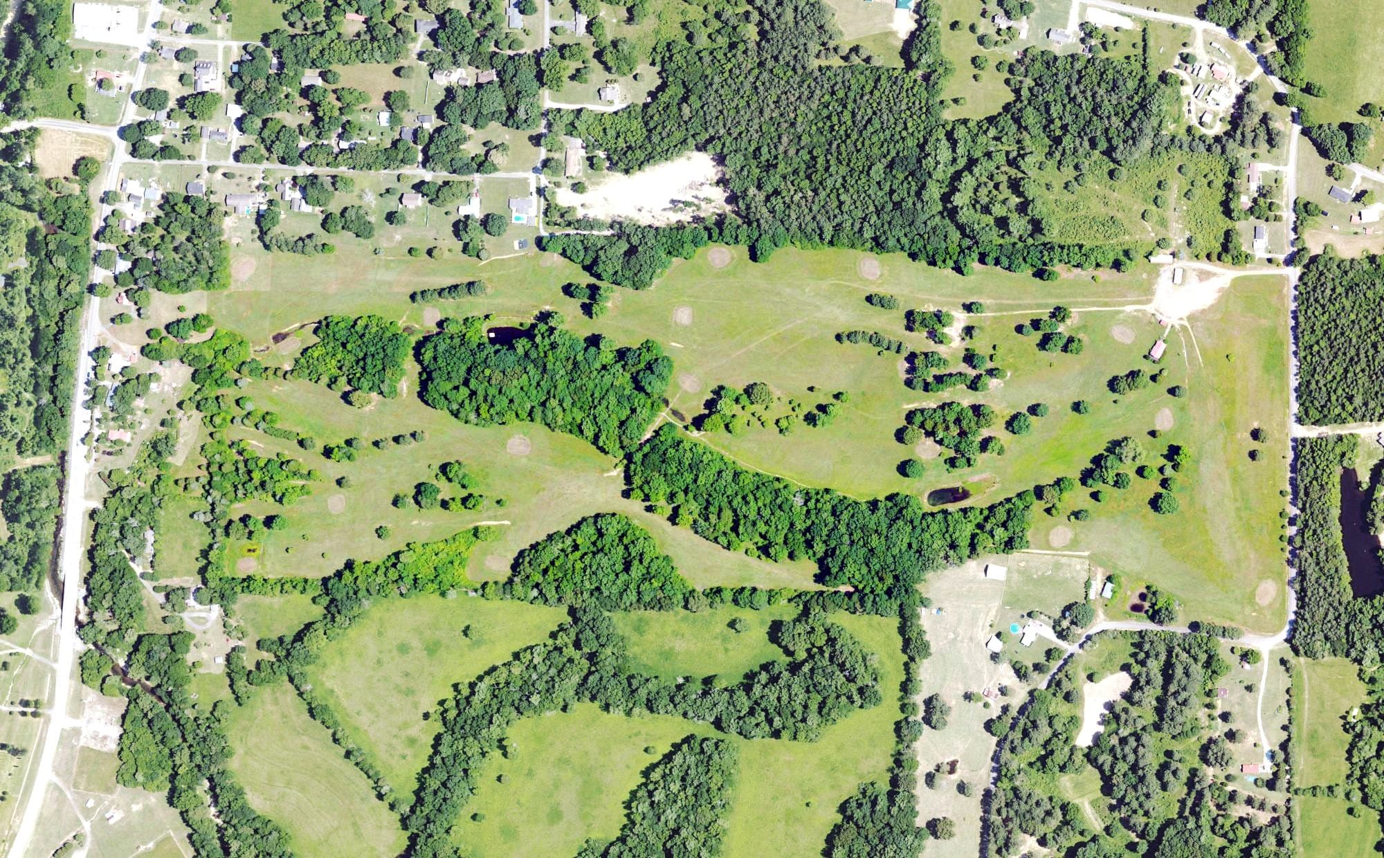 Aerial view of The Golf Club, AL, with its hole routing marked