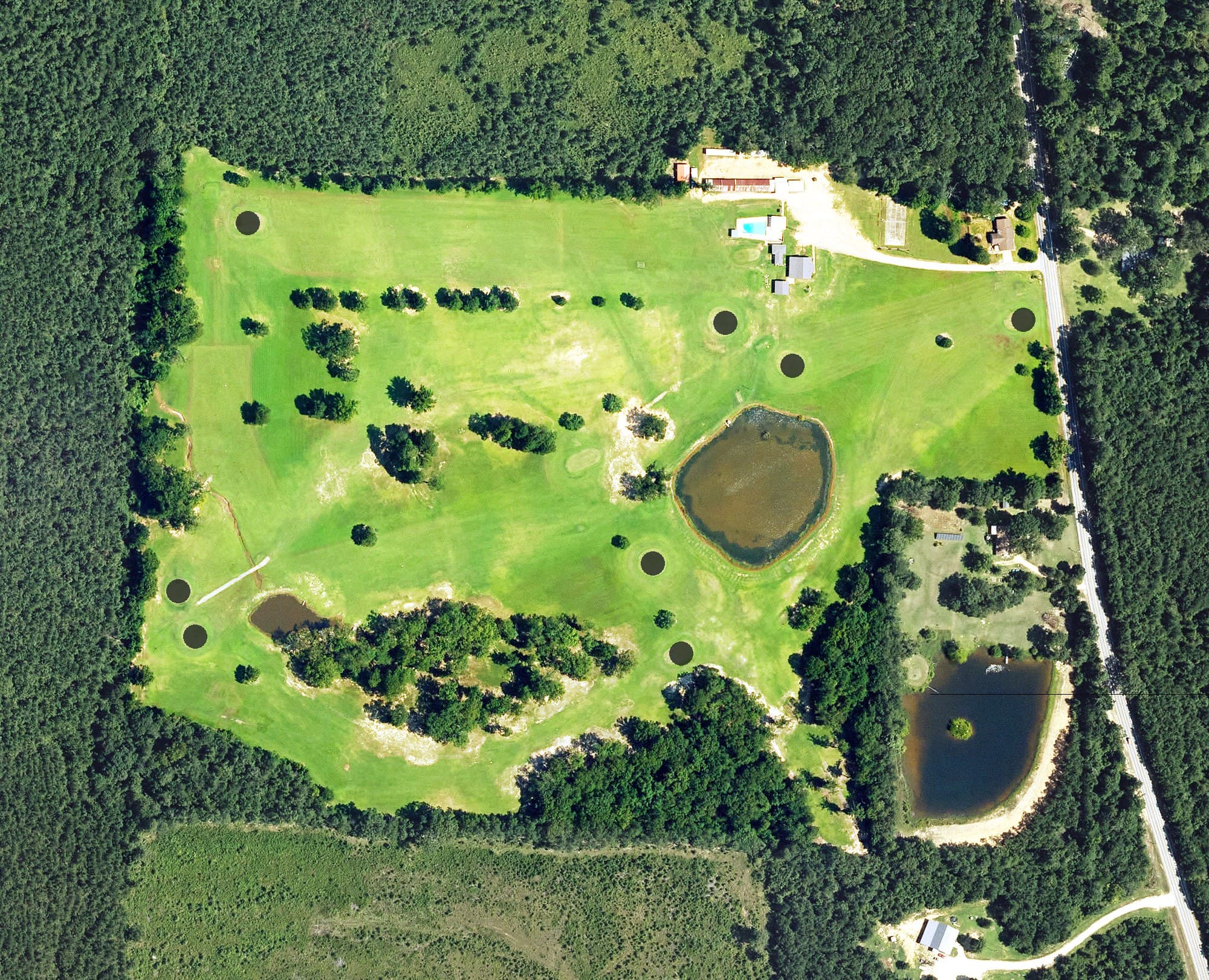 Aerial view of Gurdon Golf Course, AR, with its hole routing marked