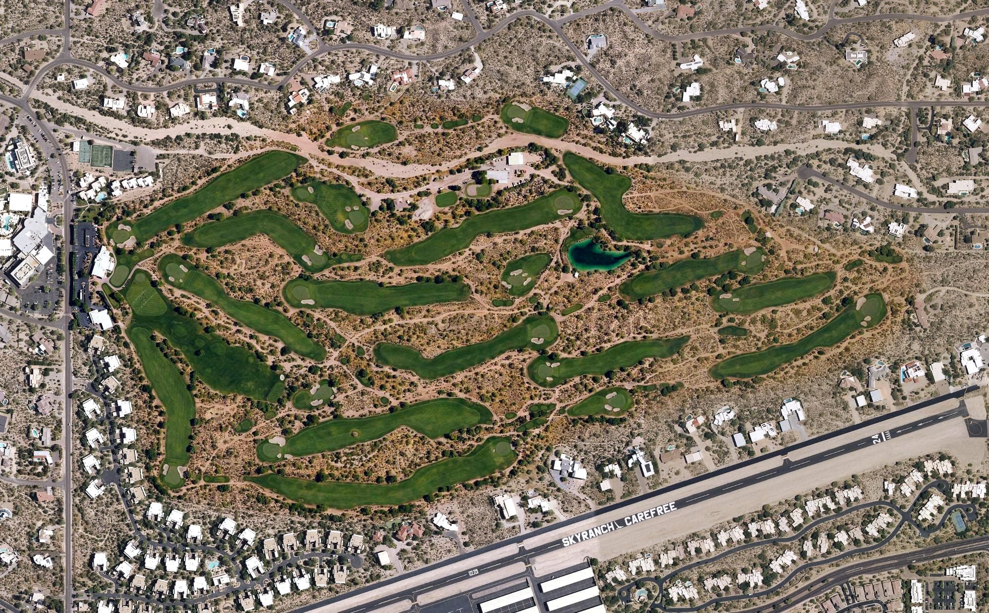 Aerial view of Desert Forest Golf Club, AZ, with its hole routing marked