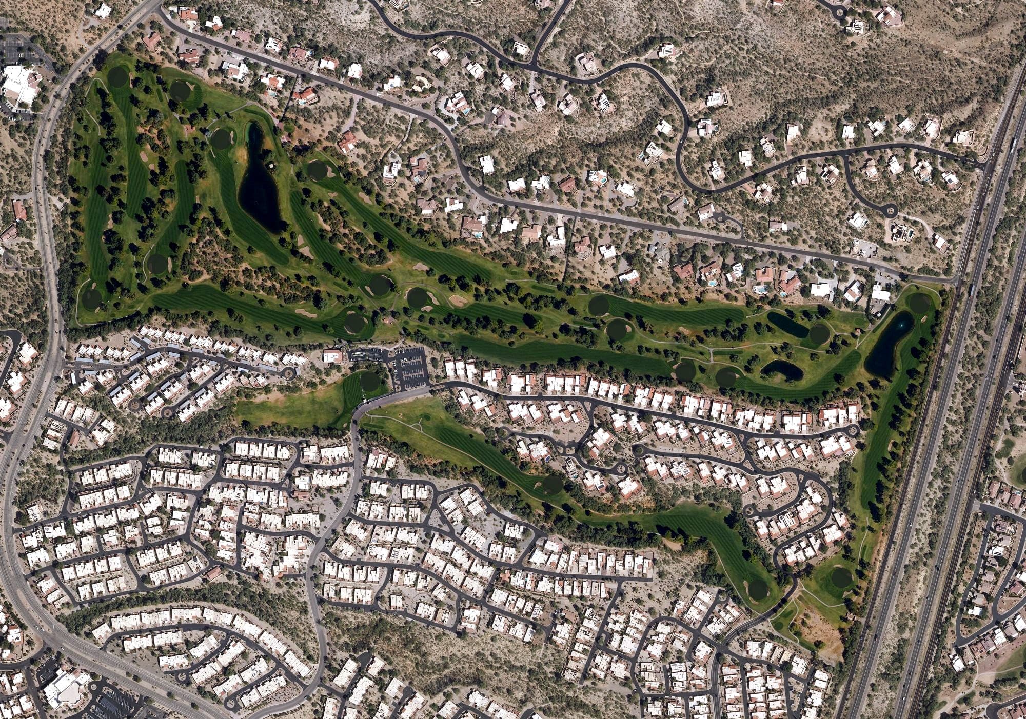 Aerial view of Desert Hills Golf Club of Green Valley, AZ, with its hole routing marked