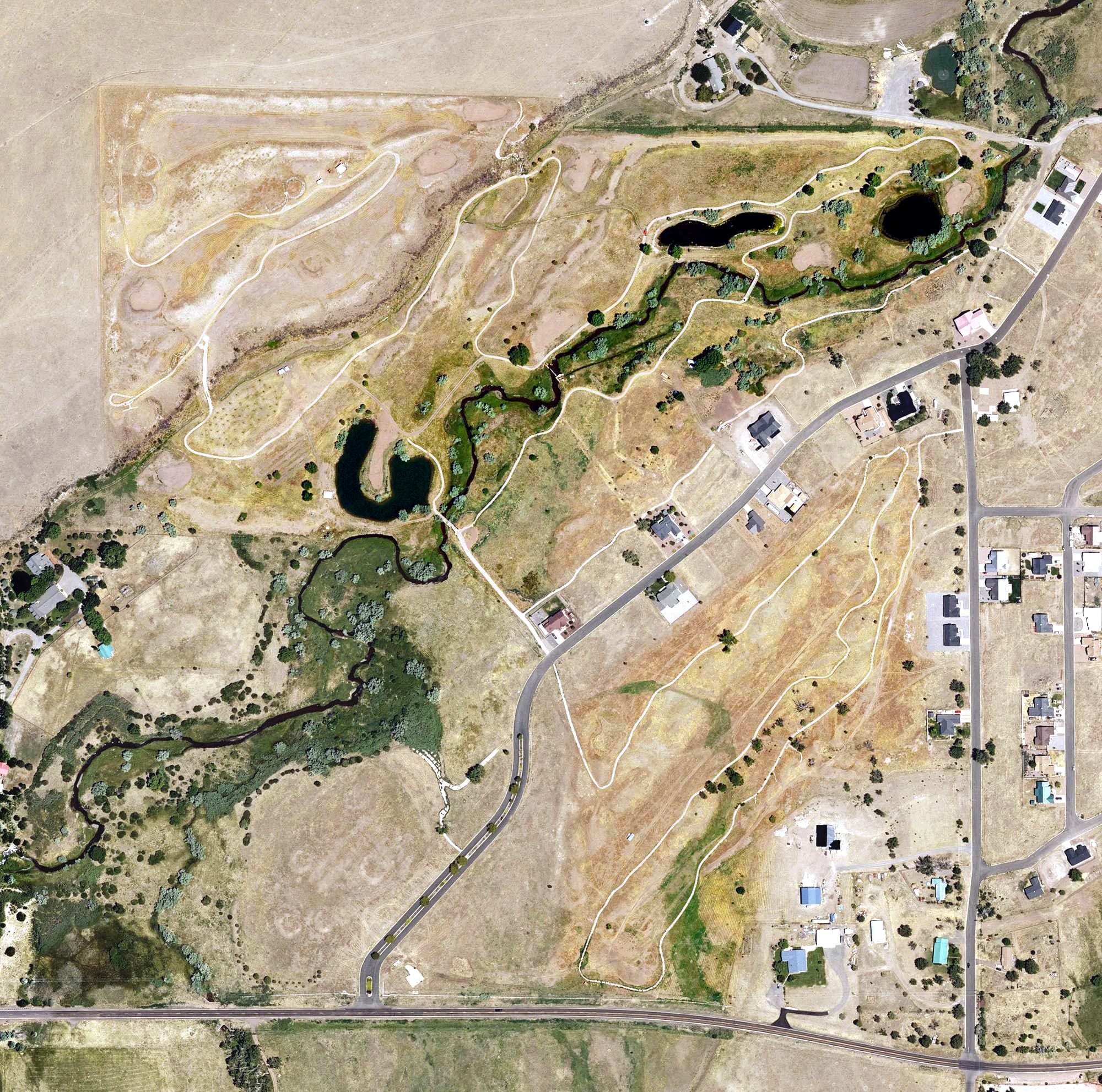 Aerial view of Greer Lakes, AZ, with its hole routing marked