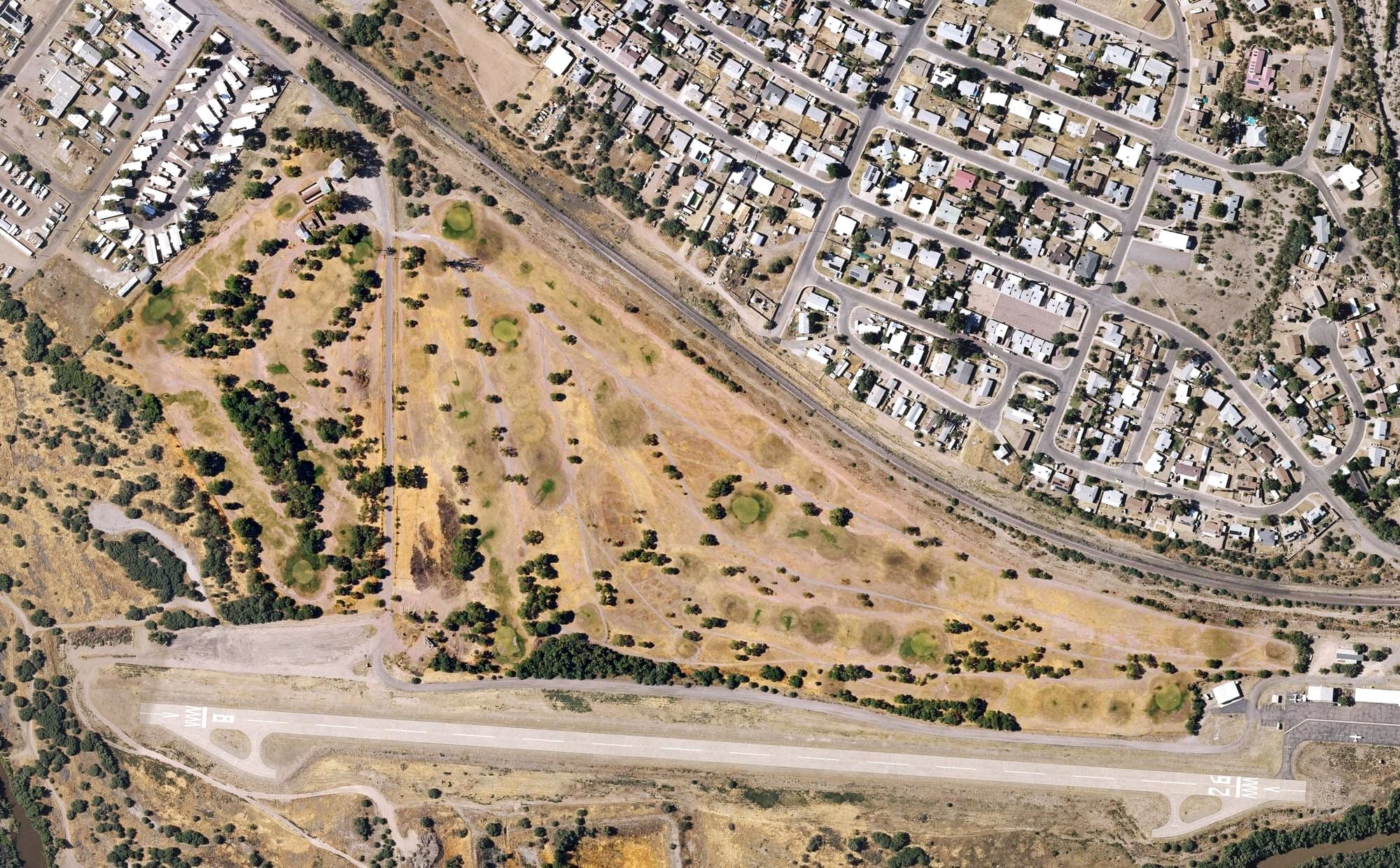 Aerial view of Kearny Golf Club, AZ, with its hole routing marked