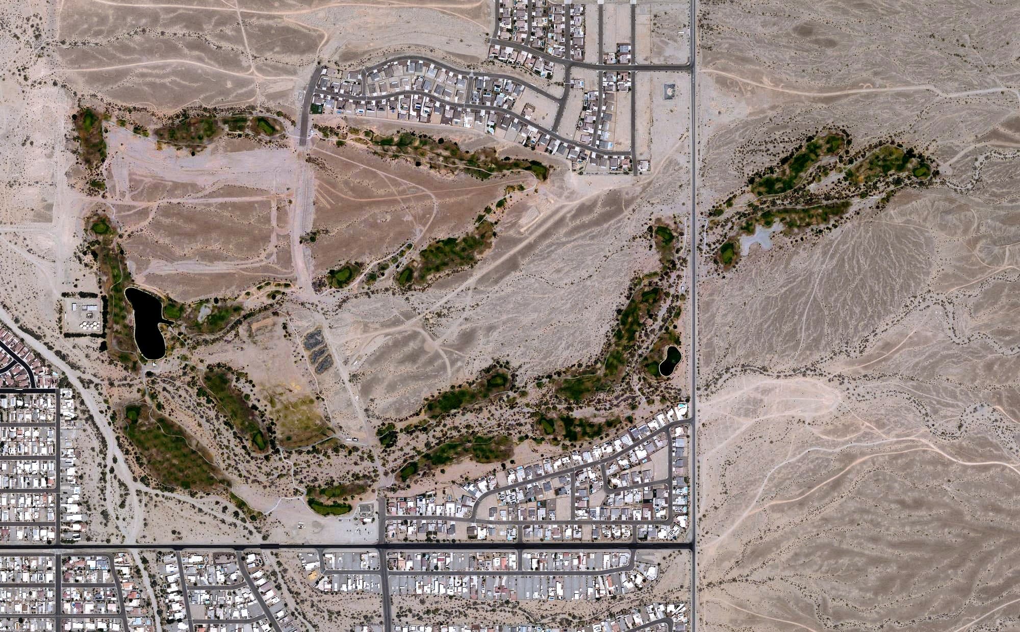 Aerial view of Las Barrancas Golf Course, AZ, with its hole routing marked
